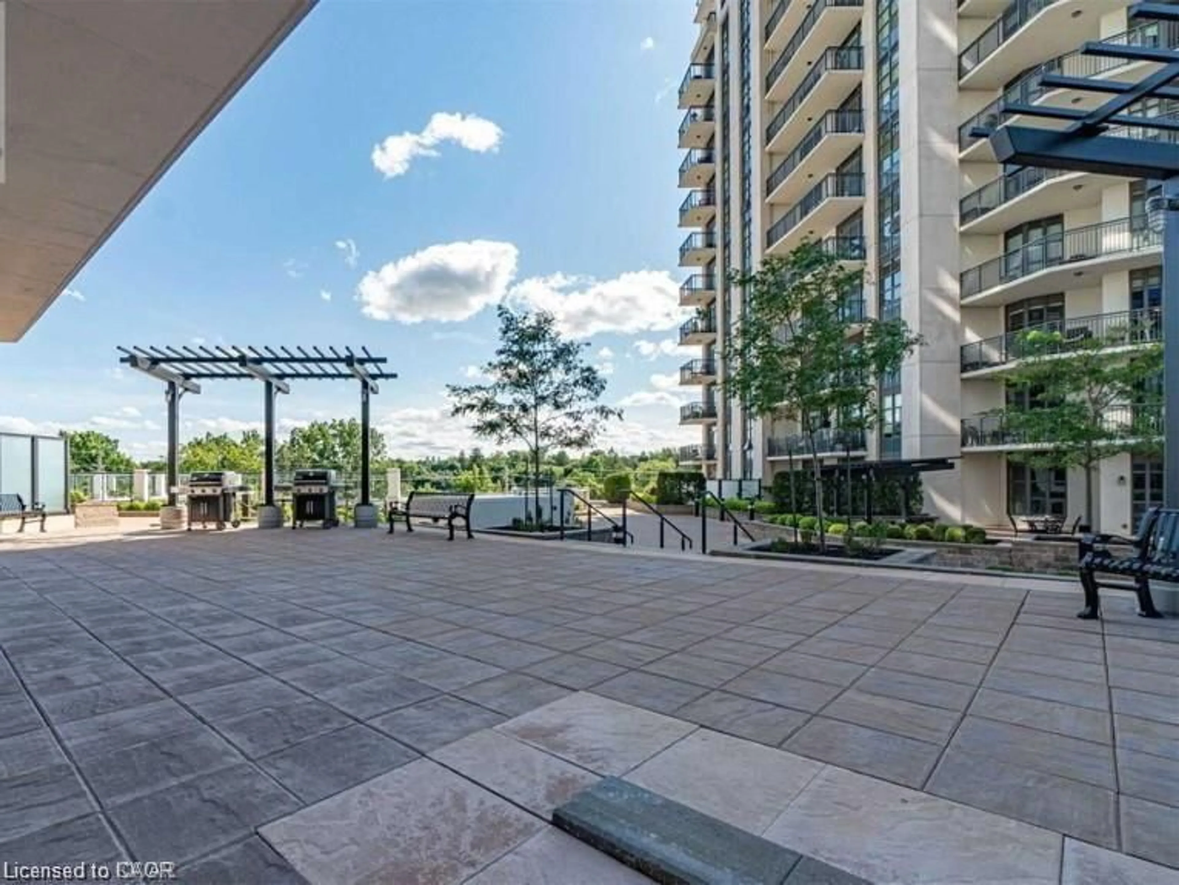 Patio, city buildings view from balcony for 155 Caroline St #1408, Kitchener Ontario N2L 0J8