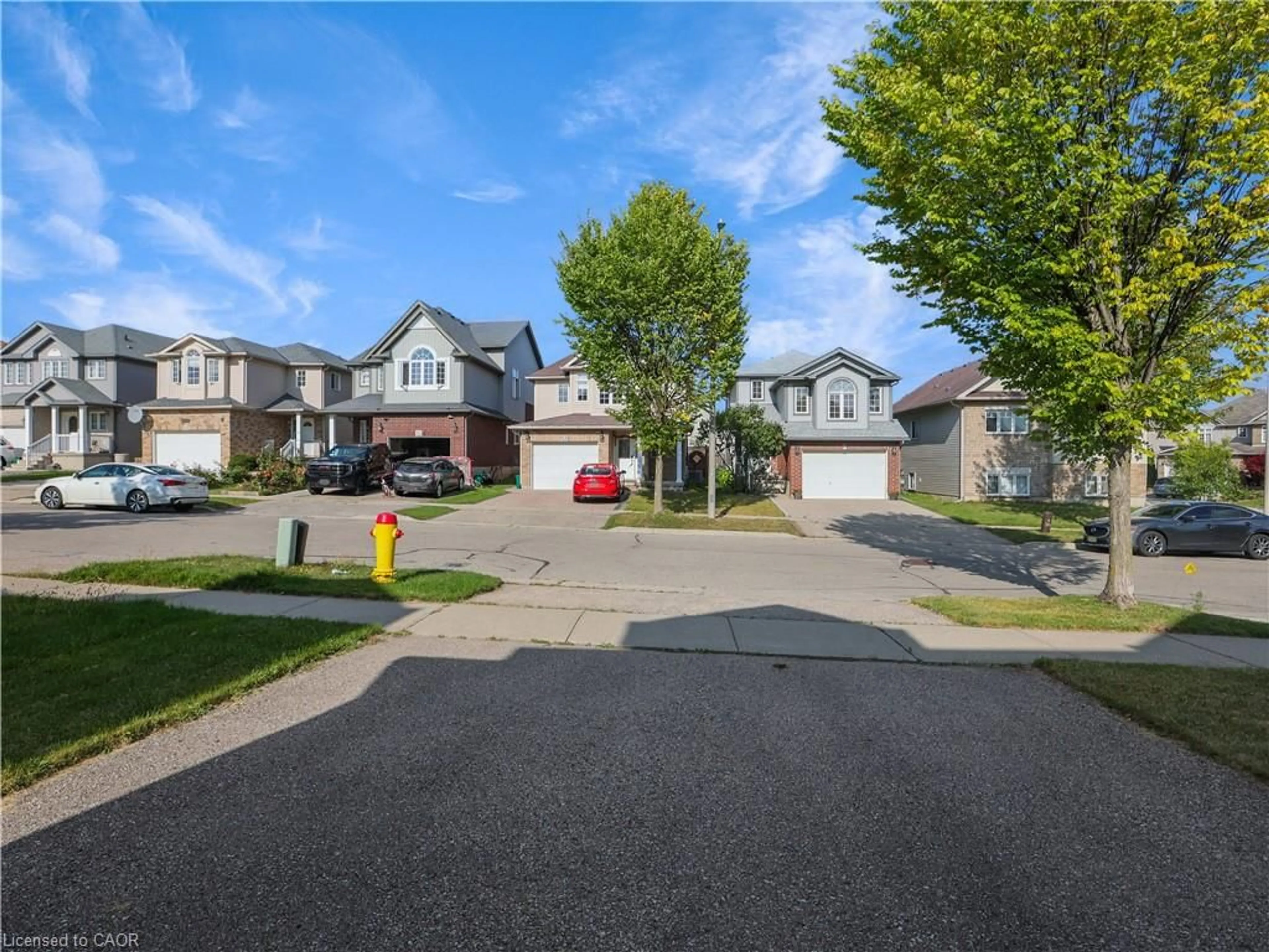 A pic from outside/outdoor area/front of a property/back of a property/a pic from drone, street for 36 Lemon Grass St, Kitchener Ontario N2N 3R5