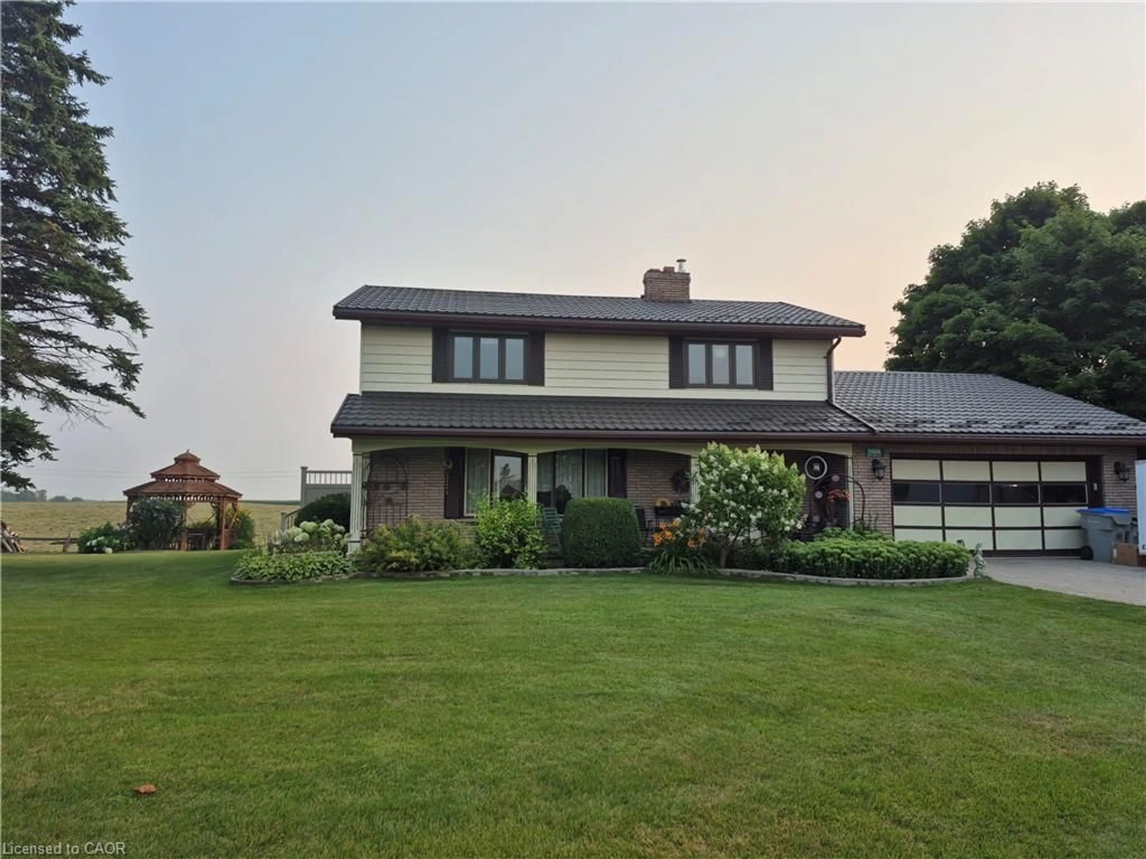 A pic from outside/outdoor area/front of a property/back of a property/a pic from drone, street for 5908 Rd 119, Brunner Ontario N0K 1C0