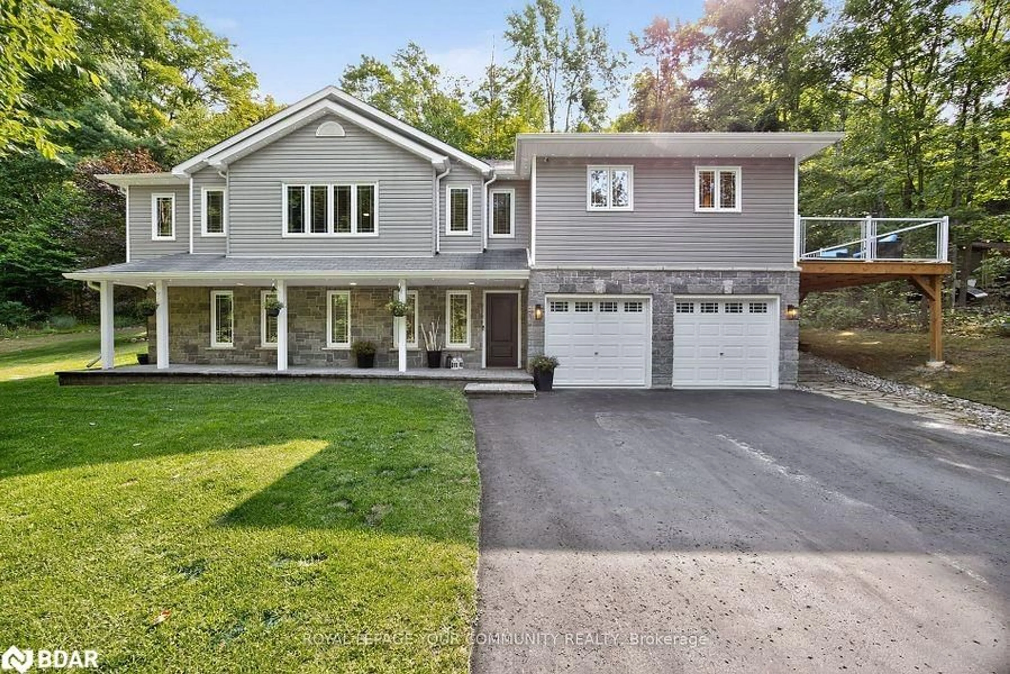 Home with vinyl exterior material, street for 135 Huron Woods Drive, Coldwater Ontario L0K 1E0