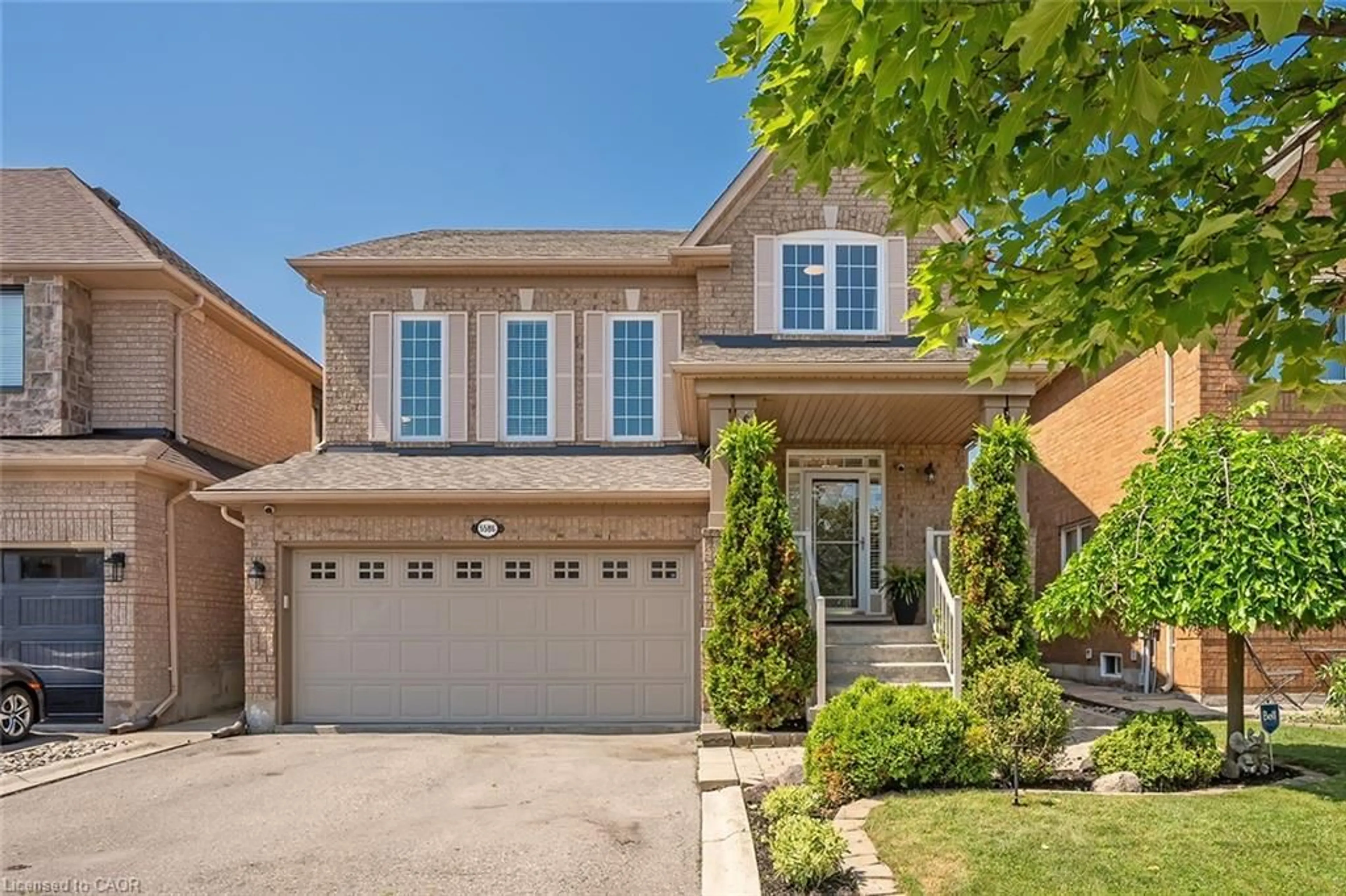 Home with brick exterior material, street for 5586 Churchill Meadows Blvd, Mississauga Ontario L5M 6M6