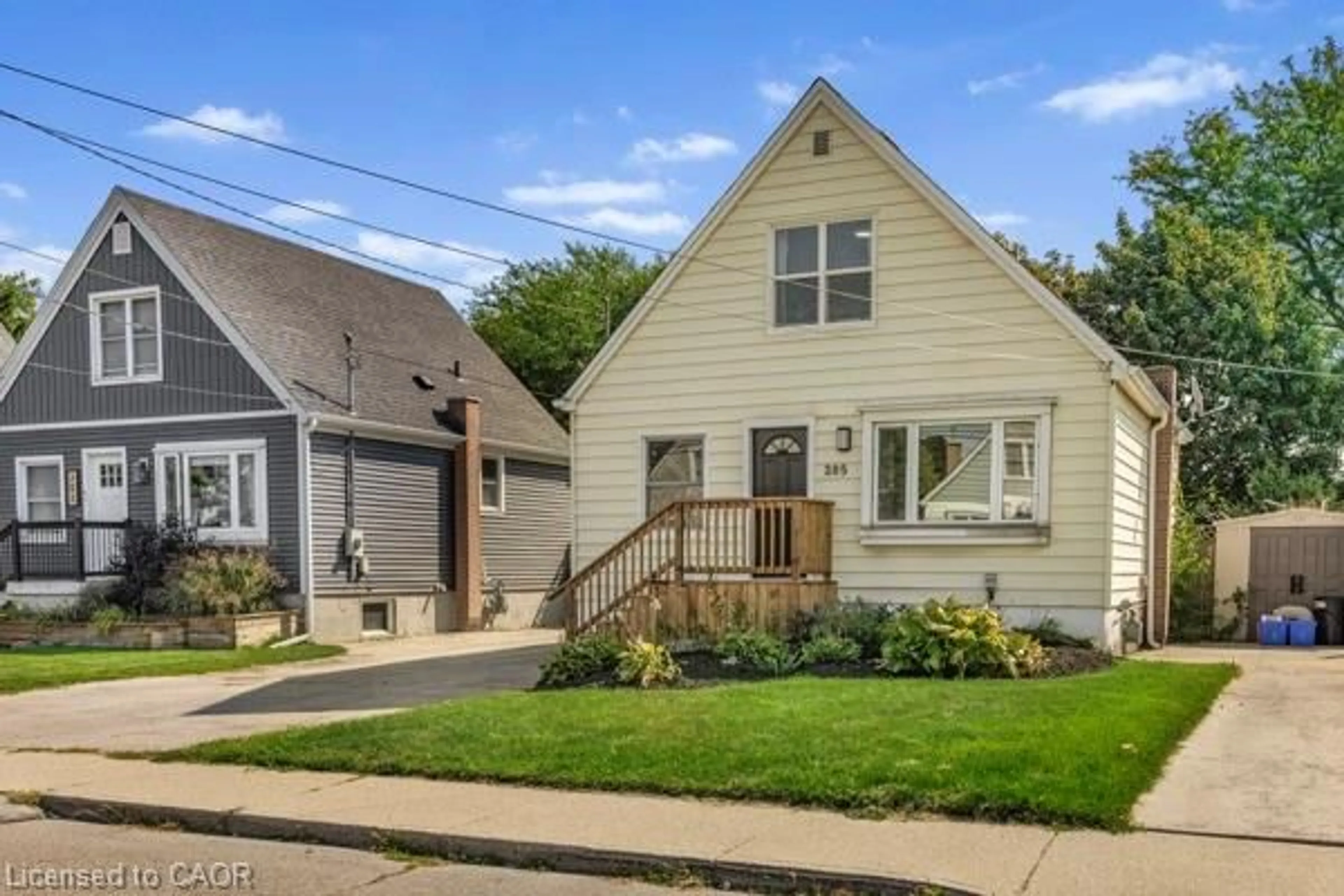 Home with vinyl exterior material, street for 205 East 26th St, Hamilton Ontario L8V 3C7