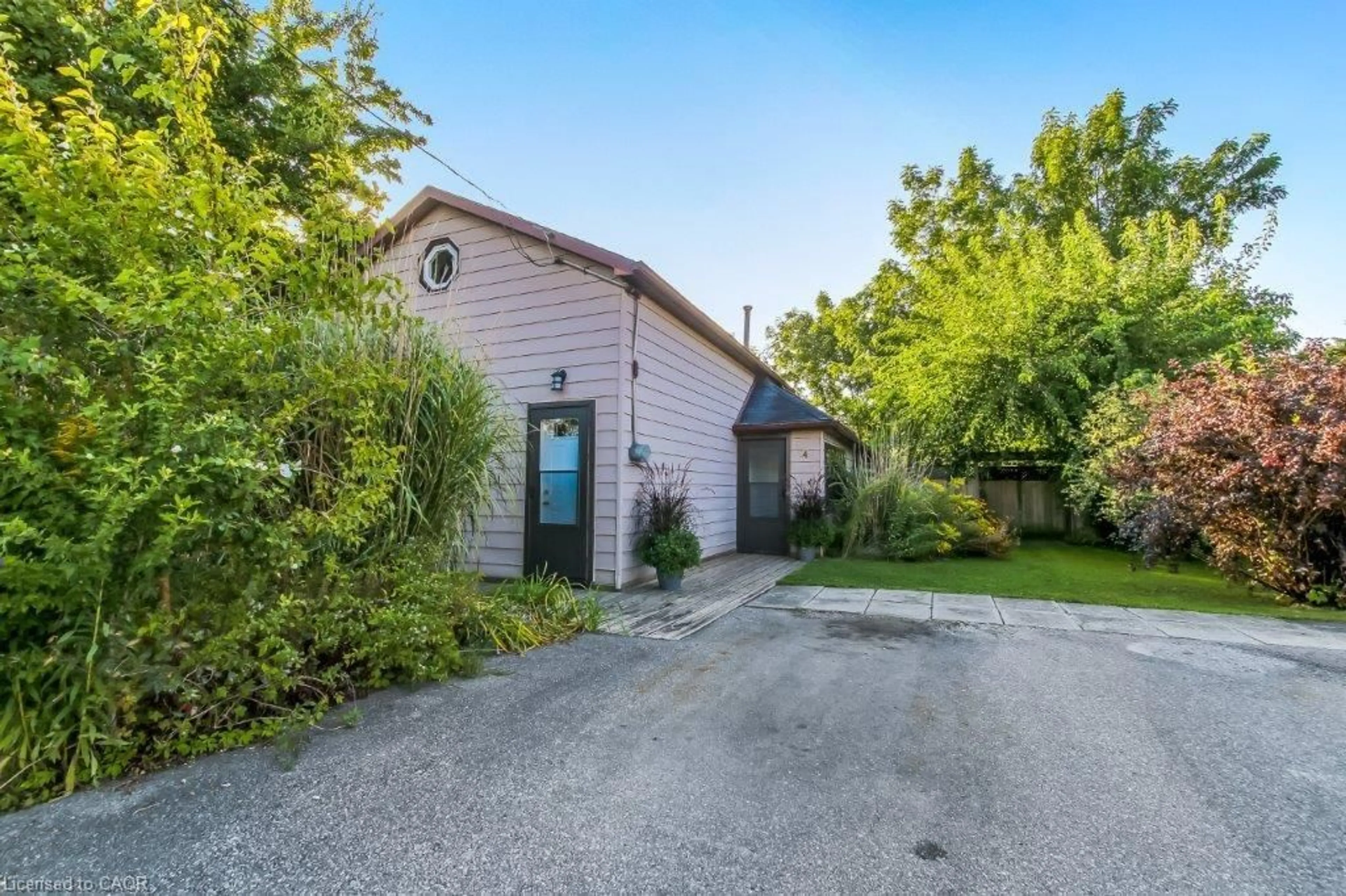 A pic from outside/outdoor area/front of a property/back of a property/a pic from drone, street for 24 Centre St, Port Rowan Ontario N0E 1M0