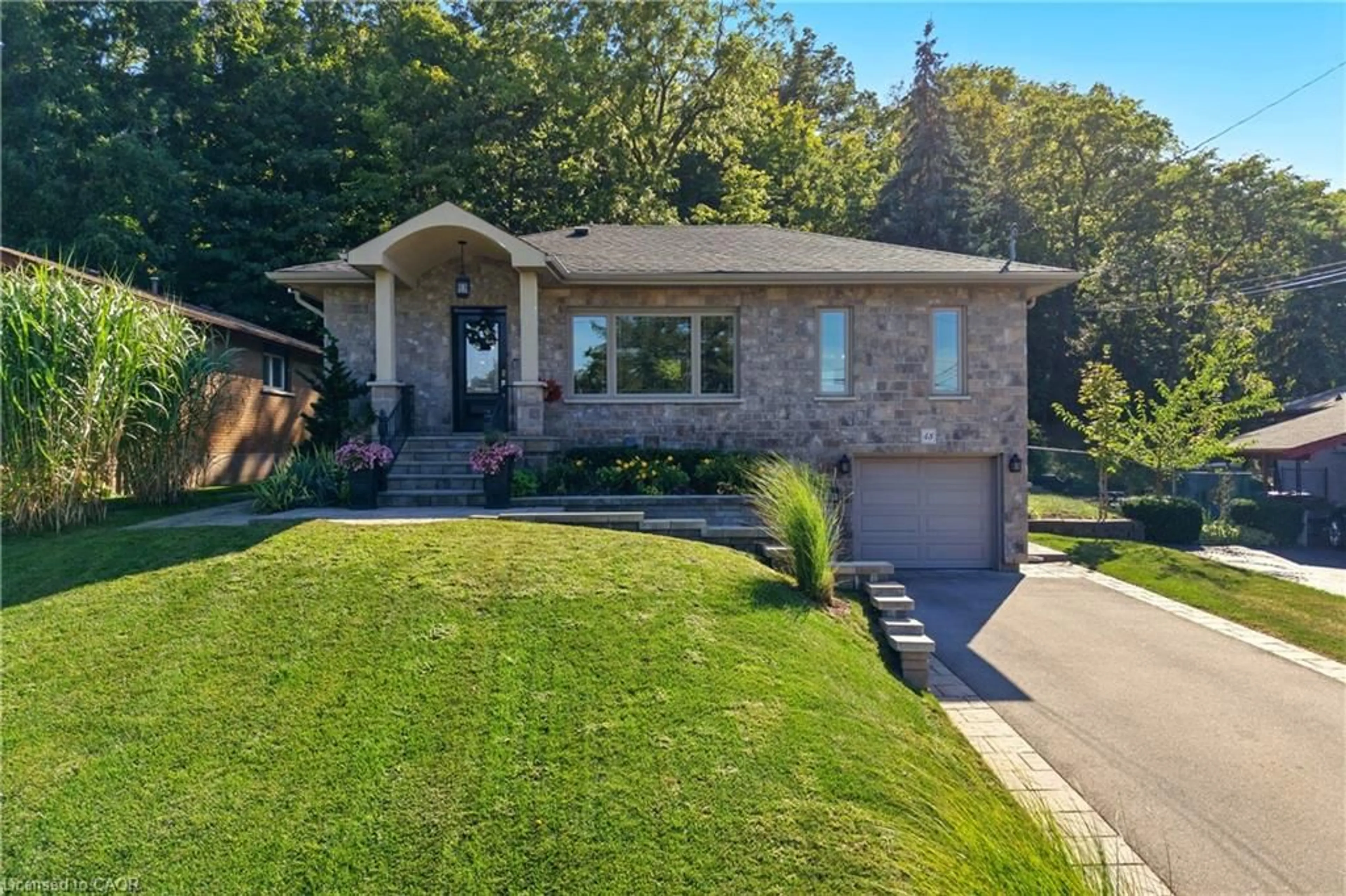 Home with brick exterior material, street for 48 Brentwood Dr, Stoney Creek Ontario L8T 3V8