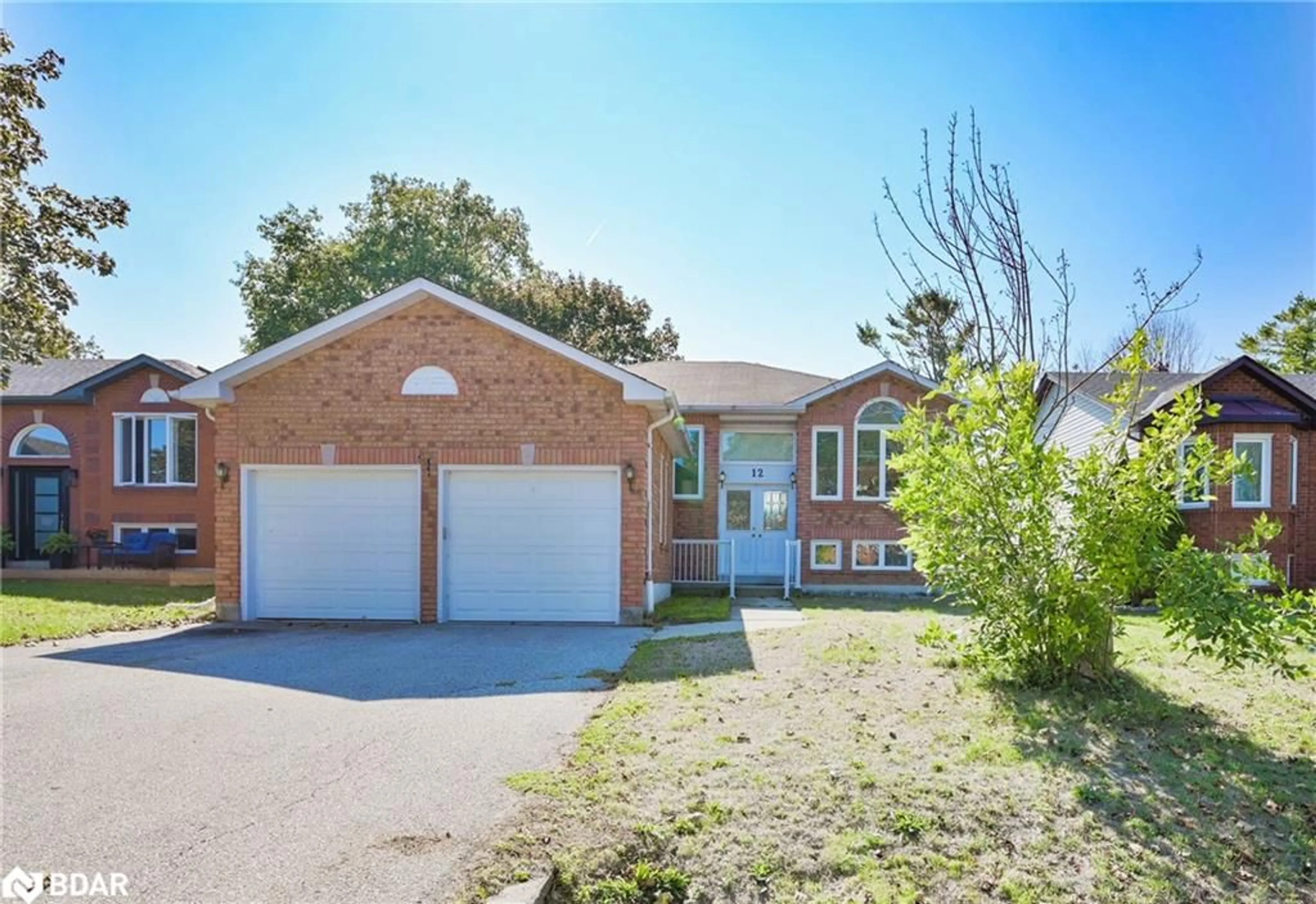 Home with brick exterior material, street for 12 Langevin Dr, Wasaga Beach Ontario L9Z 1C6