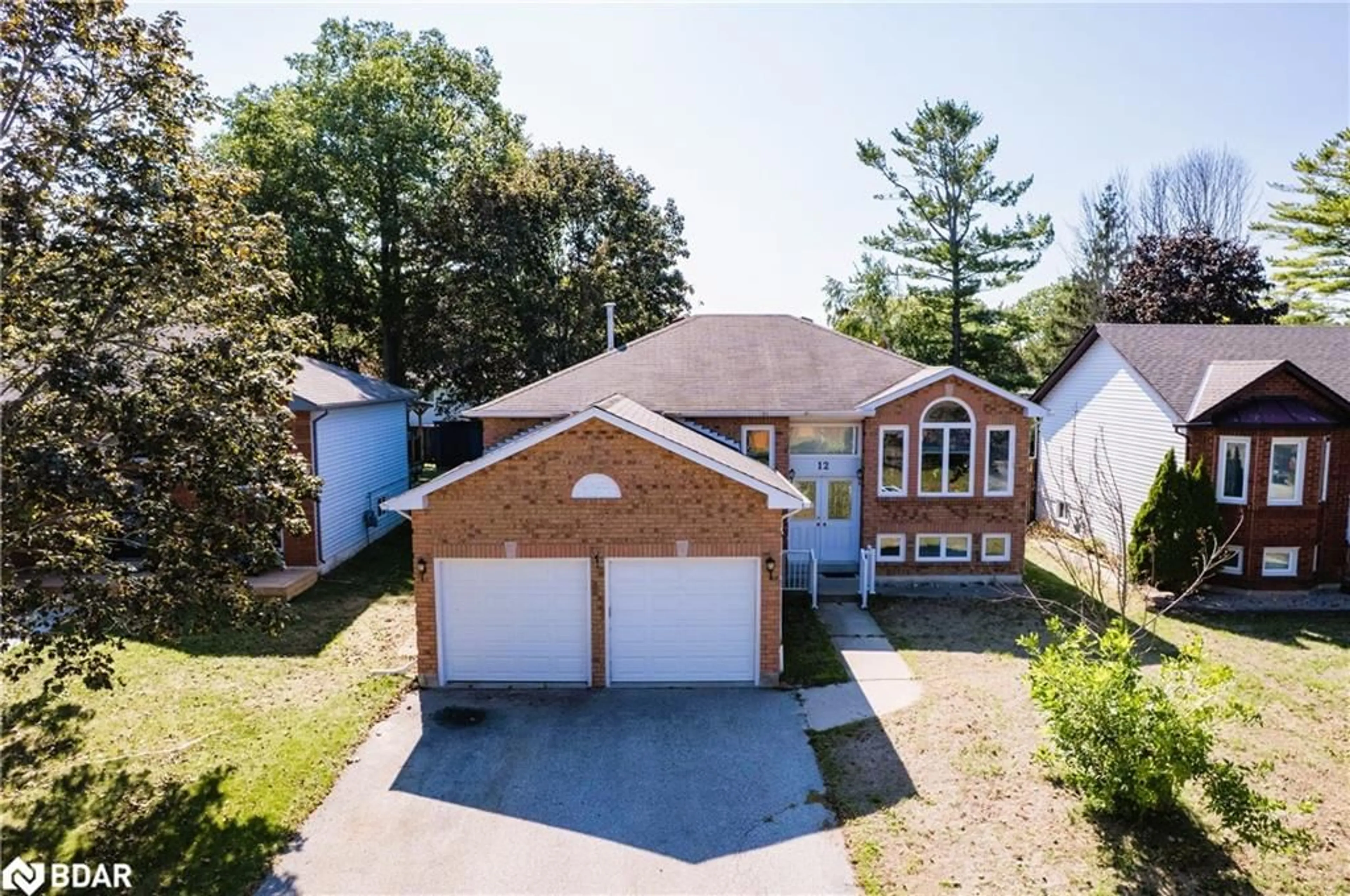 A pic from outside/outdoor area/front of a property/back of a property/a pic from drone, street for 12 Langevin Dr, Wasaga Beach Ontario L9Z 1C6
