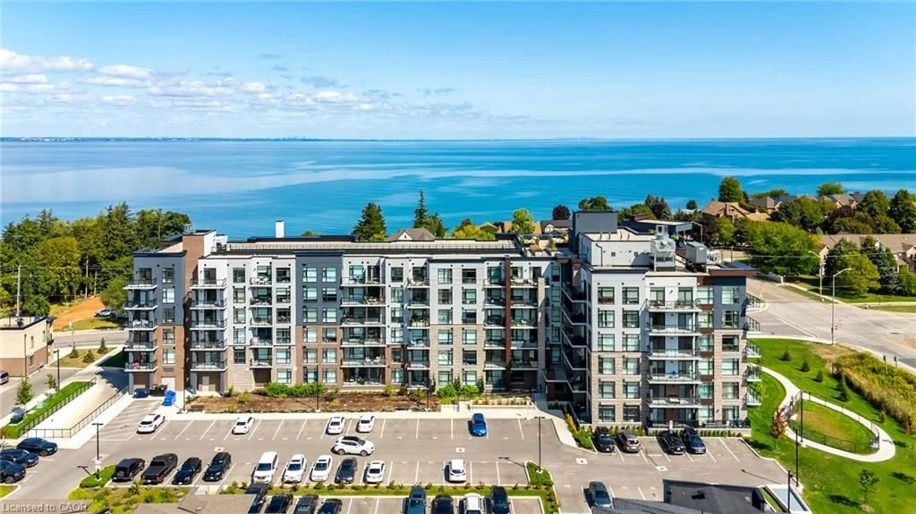 A pic from outside/outdoor area/front of a property/back of a property/a pic from drone, water/lake/river/ocean view for 600 North Service Rd #204, Stoney Creek Ontario L8E 0L2