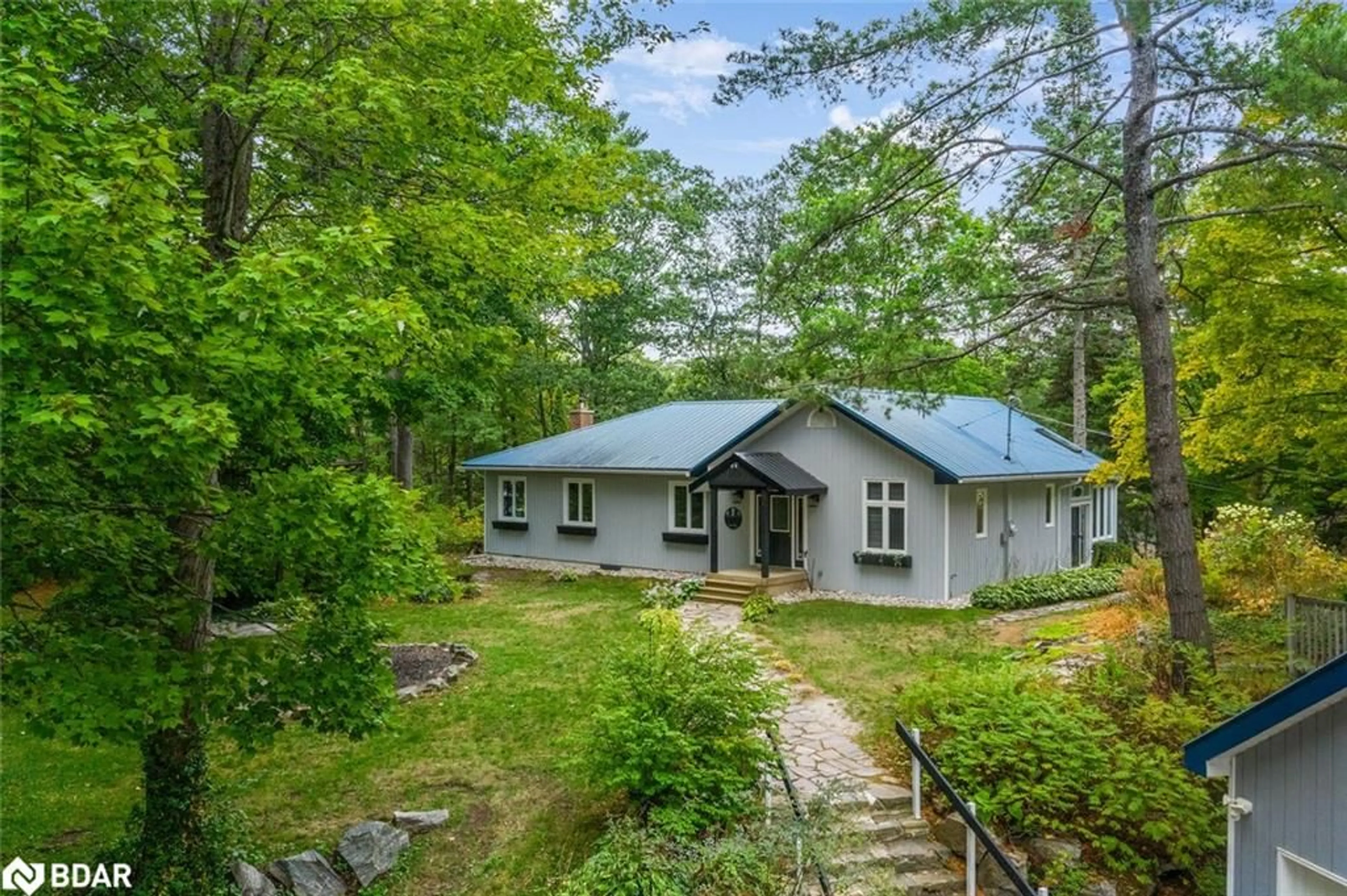 A pic from outside/outdoor area/front of a property/back of a property/a pic from drone, forest/trees view for 3183 Green River Drive, Severn Ontario L0K 2B0