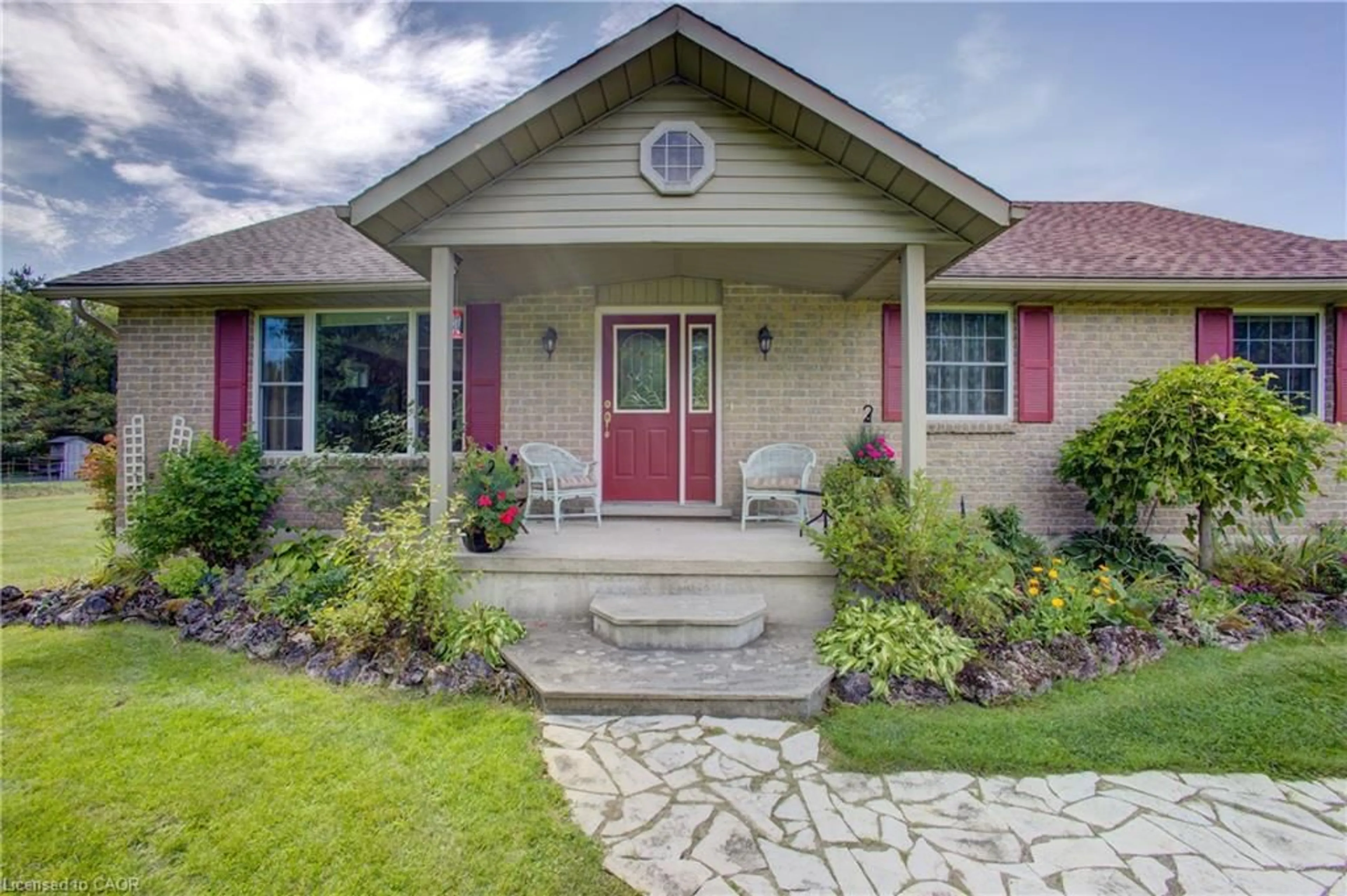 Home with brick exterior material, street for 394358 2 Concession, Durham Ontario N0G 1R0