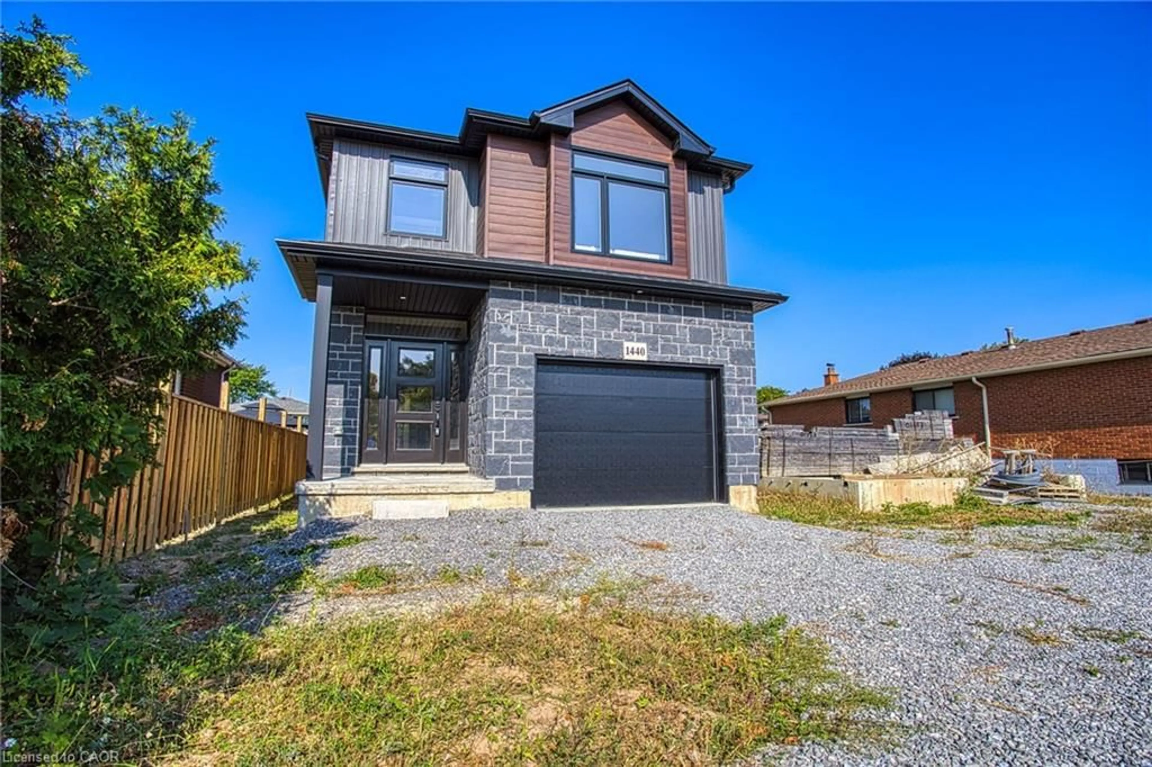 Home with brick exterior material, street for 1440 Upper Gage Ave, Hamilton Ontario L8W 1E7
