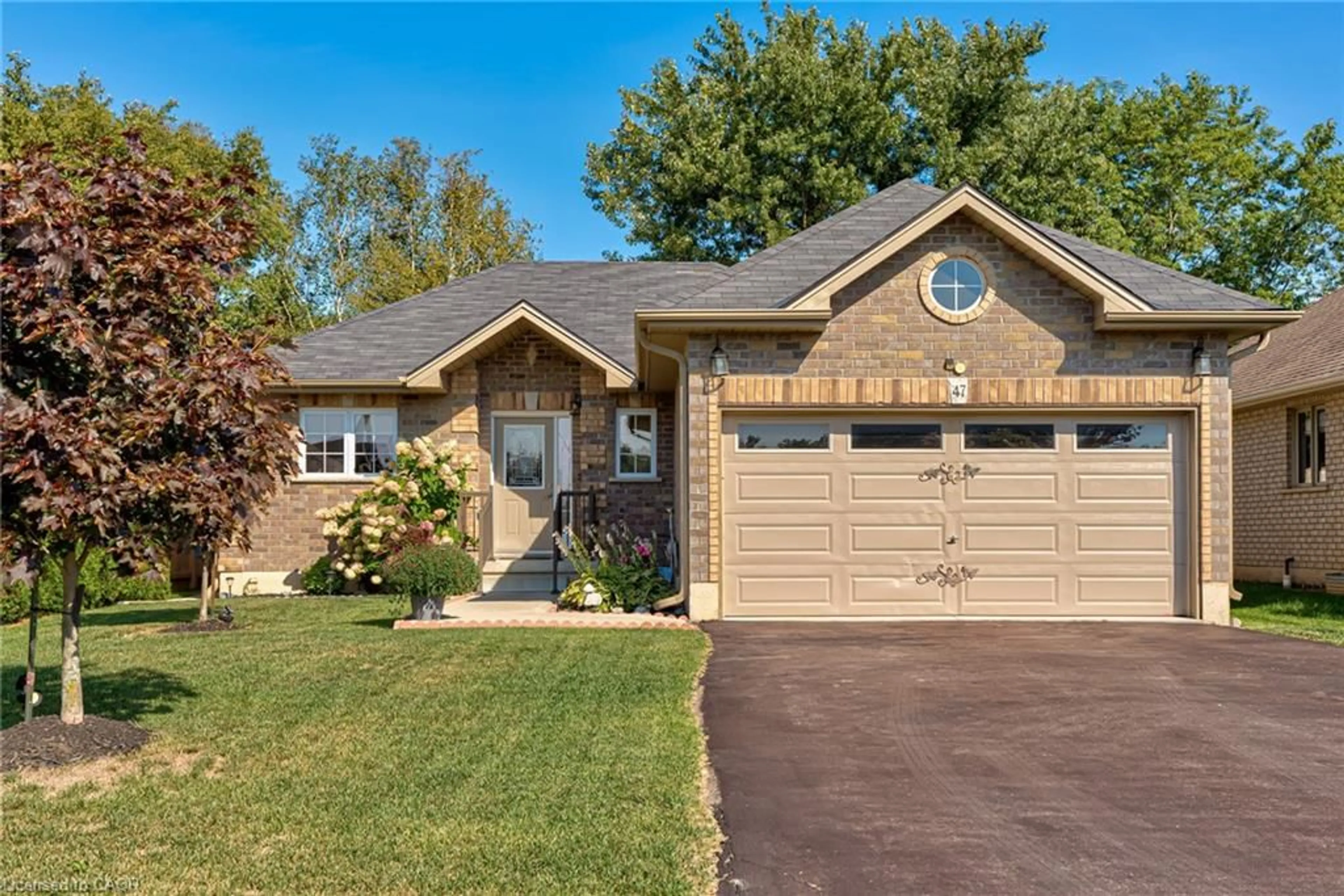 Home with brick exterior material, street for 47 Irving Drive Dr, Norwich Ontario N0J 1P0
