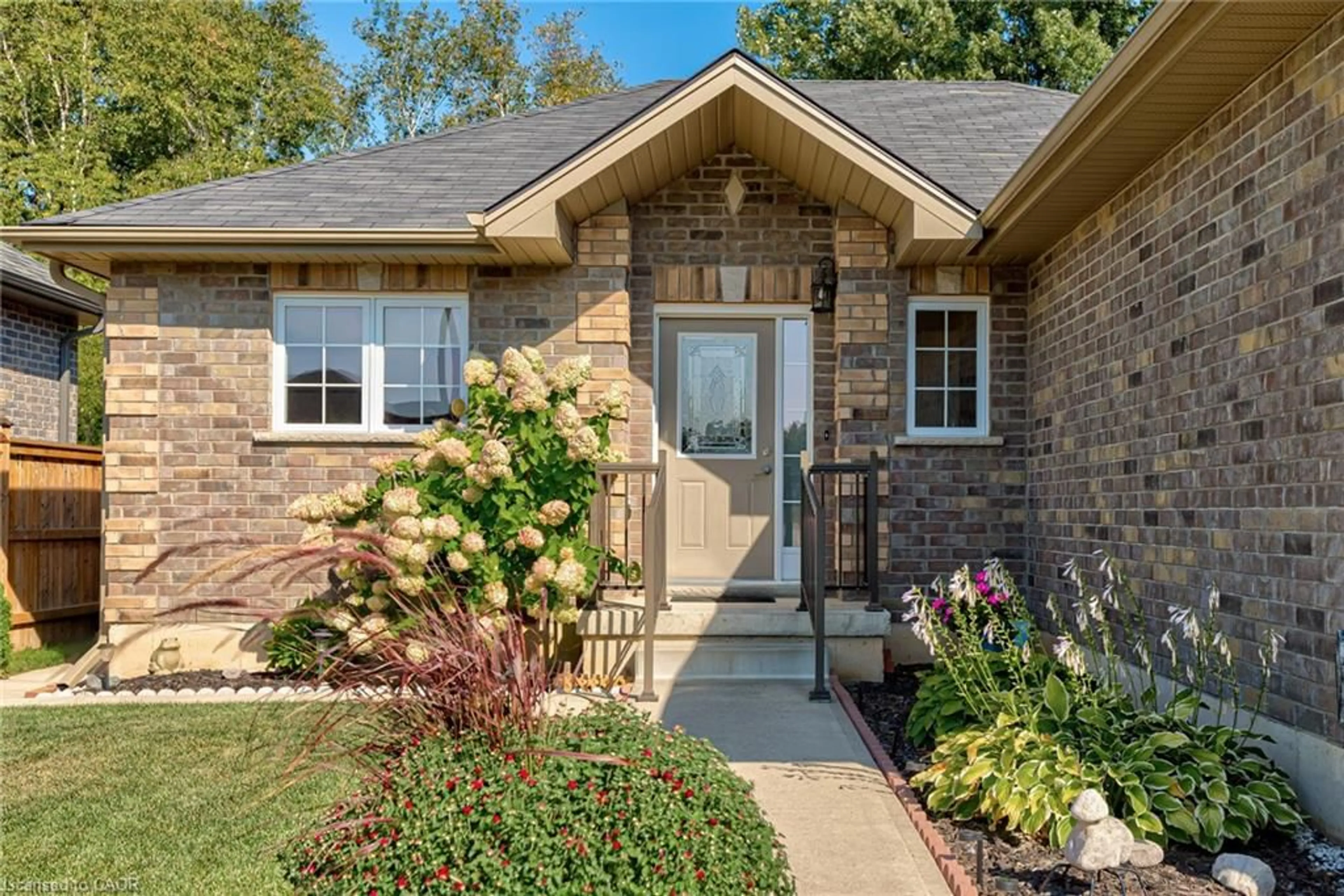 Home with brick exterior material, street for 47 Irving Drive Dr, Norwich Ontario N0J 1P0