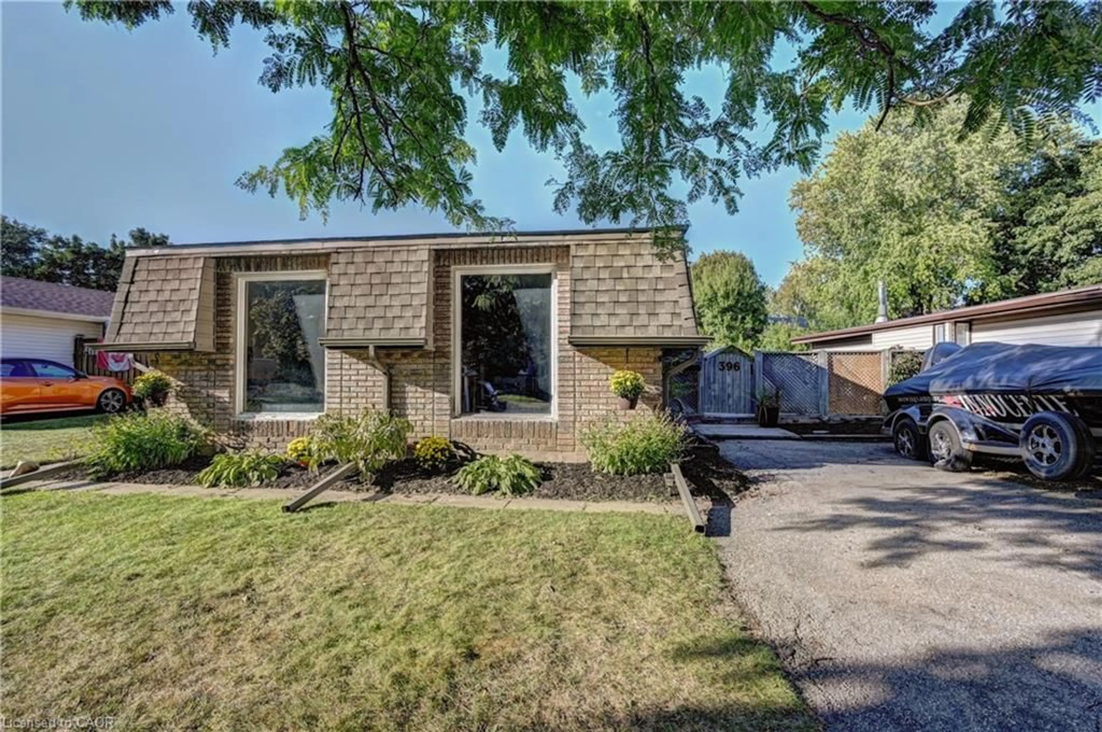 Home with brick exterior material, street for 396 Dunvegan Dr, Waterloo Ontario N2K 2C7