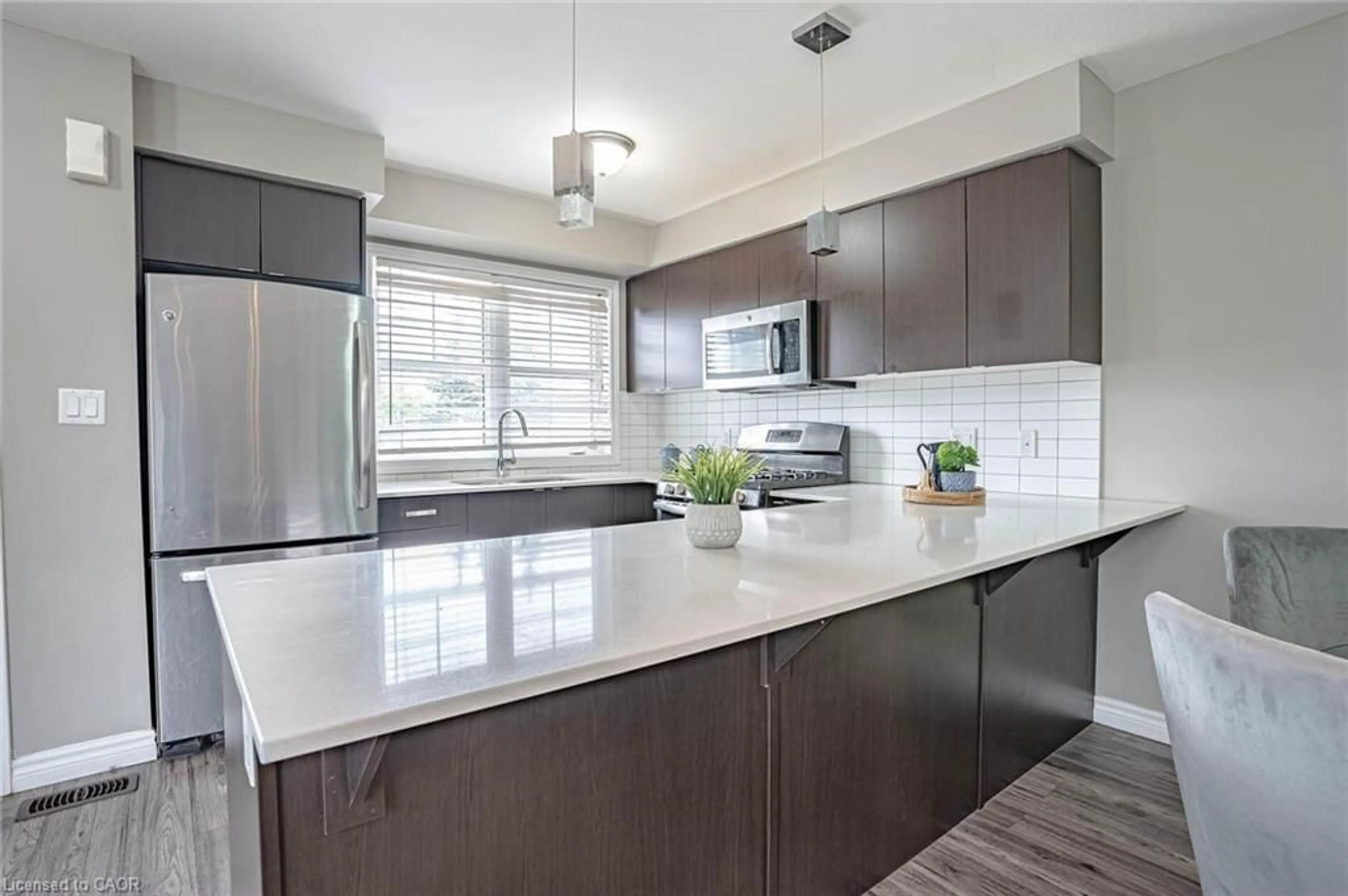 Open concept kitchen, ceramic/tile floor for 701 Homer Watson Blvd #77, Kitchener Ontario N2C 0B5
