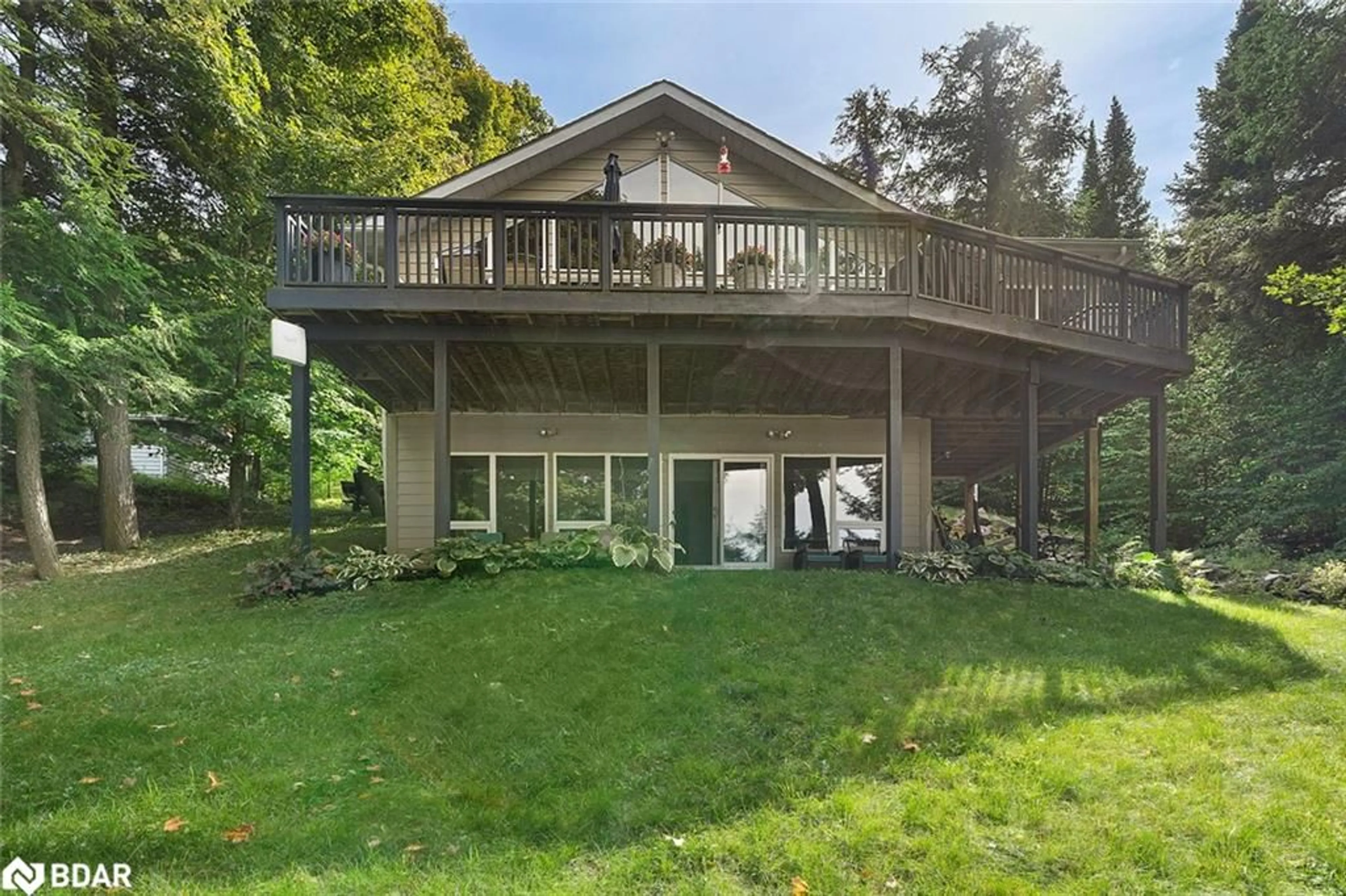 A pic from outside/outdoor area/front of a property/back of a property/a pic from drone, water/lake/river/ocean view for 1202 Windermere Rd #12, Windermere Ontario P0B 1P0