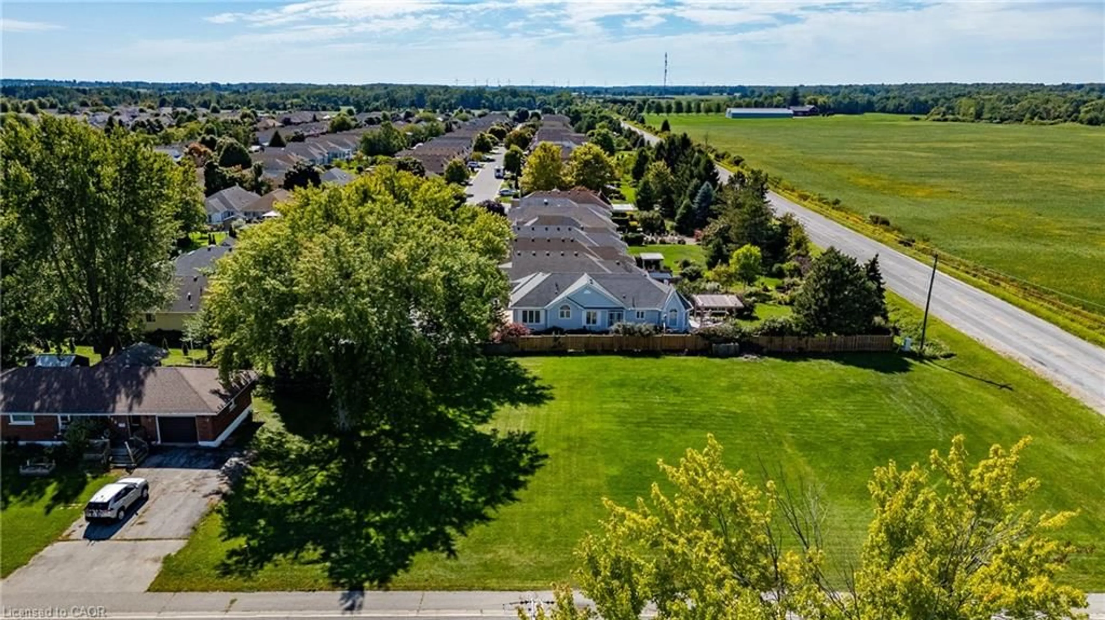 A pic from outside/outdoor area/front of a property/back of a property/a pic from drone, water/lake/river/ocean view for 1179 Bay St, Port Rowan Ontario N0E 1M0