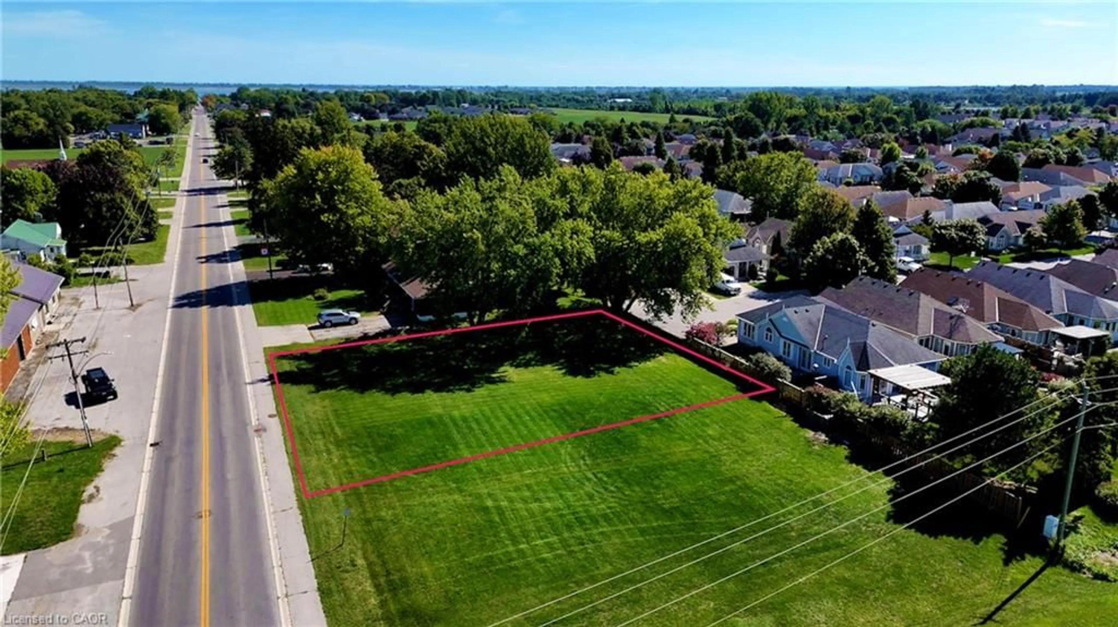 A pic from outside/outdoor area/front of a property/back of a property/a pic from drone, water/lake/river/ocean view for 1179 Bay St, Port Rowan Ontario N0E 1M0