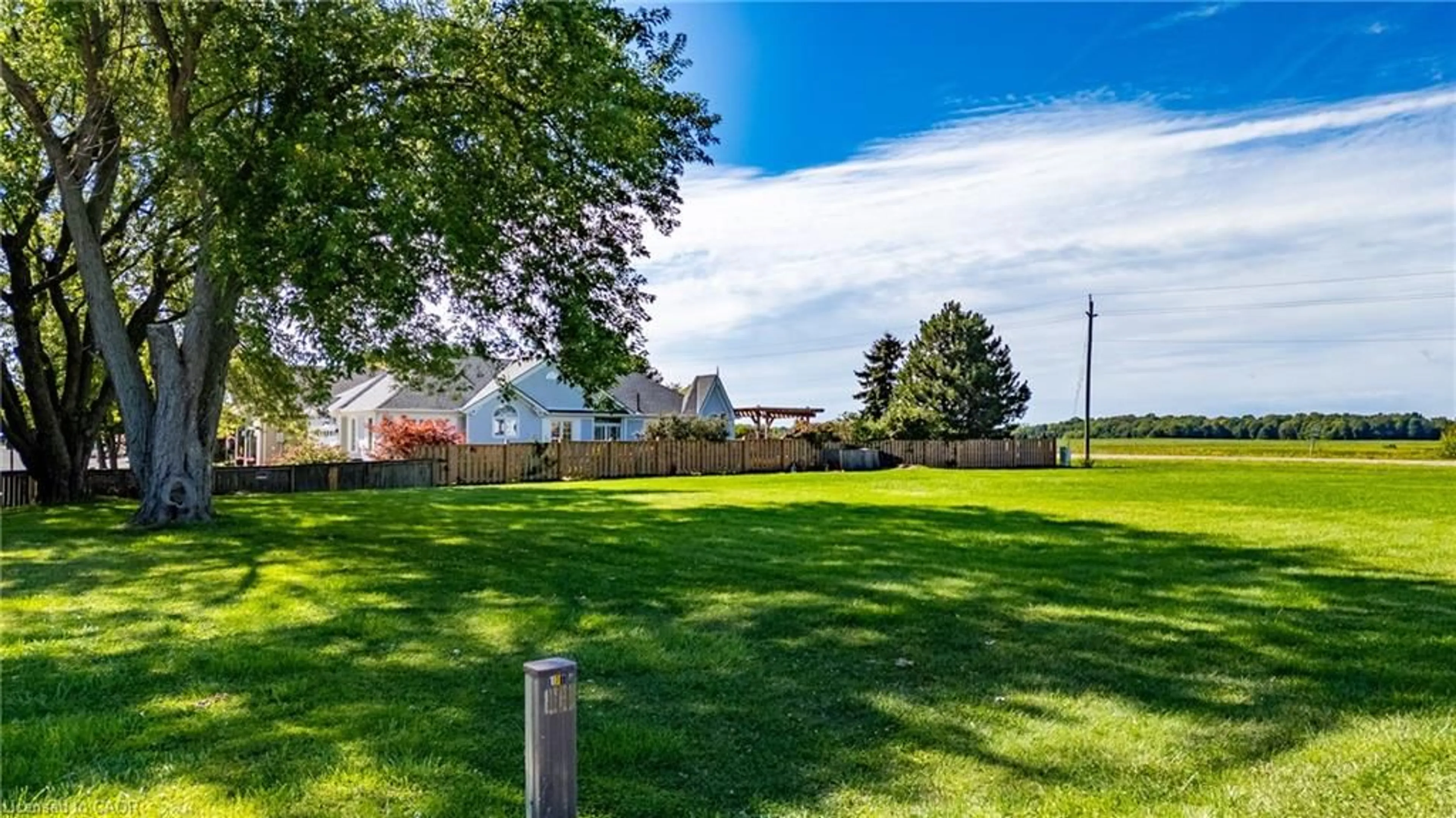 A pic from outside/outdoor area/front of a property/back of a property/a pic from drone, unknown for 1179 Bay St, Port Rowan Ontario N0E 1M0