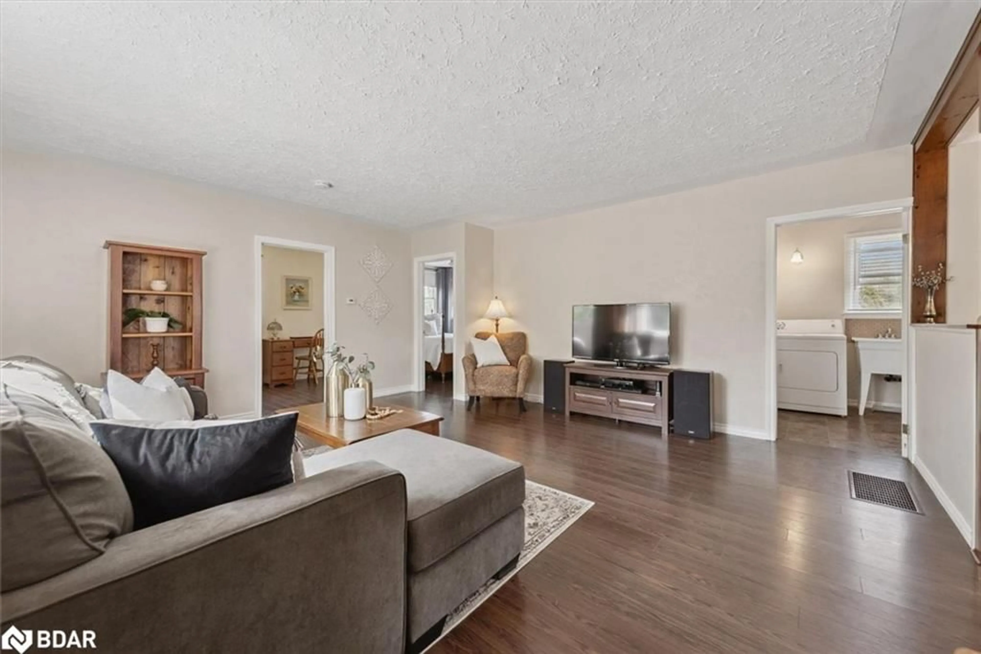 Living room with furniture, wood/laminate floor for 32805 Thorah Side Road, Beaverton Ontario L0K 1A0