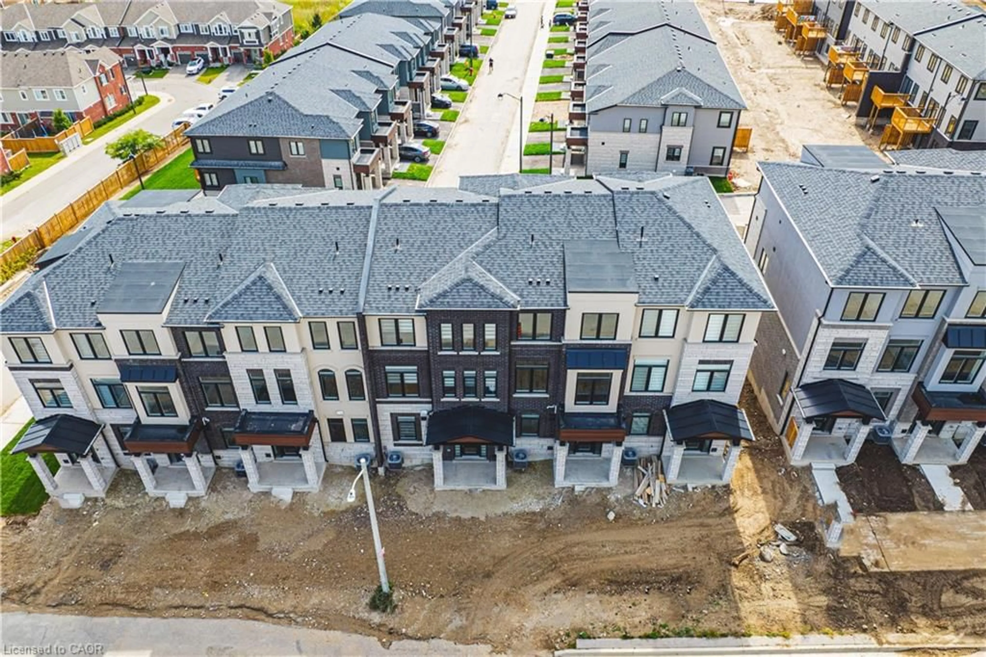 A pic from outside/outdoor area/front of a property/back of a property/a pic from drone, street for 155 Equestrian Way #37, Cambridge Ontario N3E 0E8