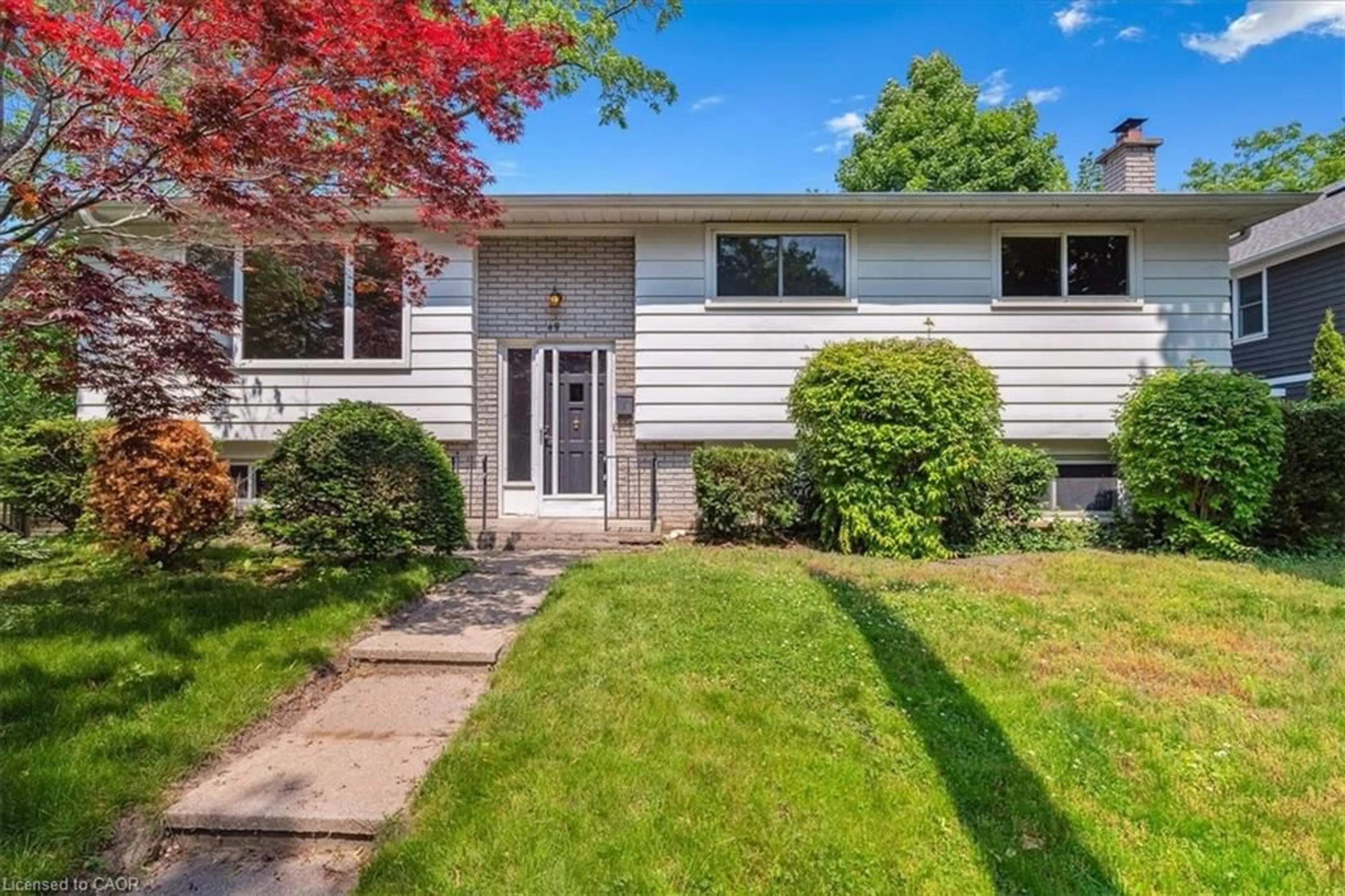 Home with vinyl exterior material, street for 49 Head St, Oakville Ontario L6K 1L4