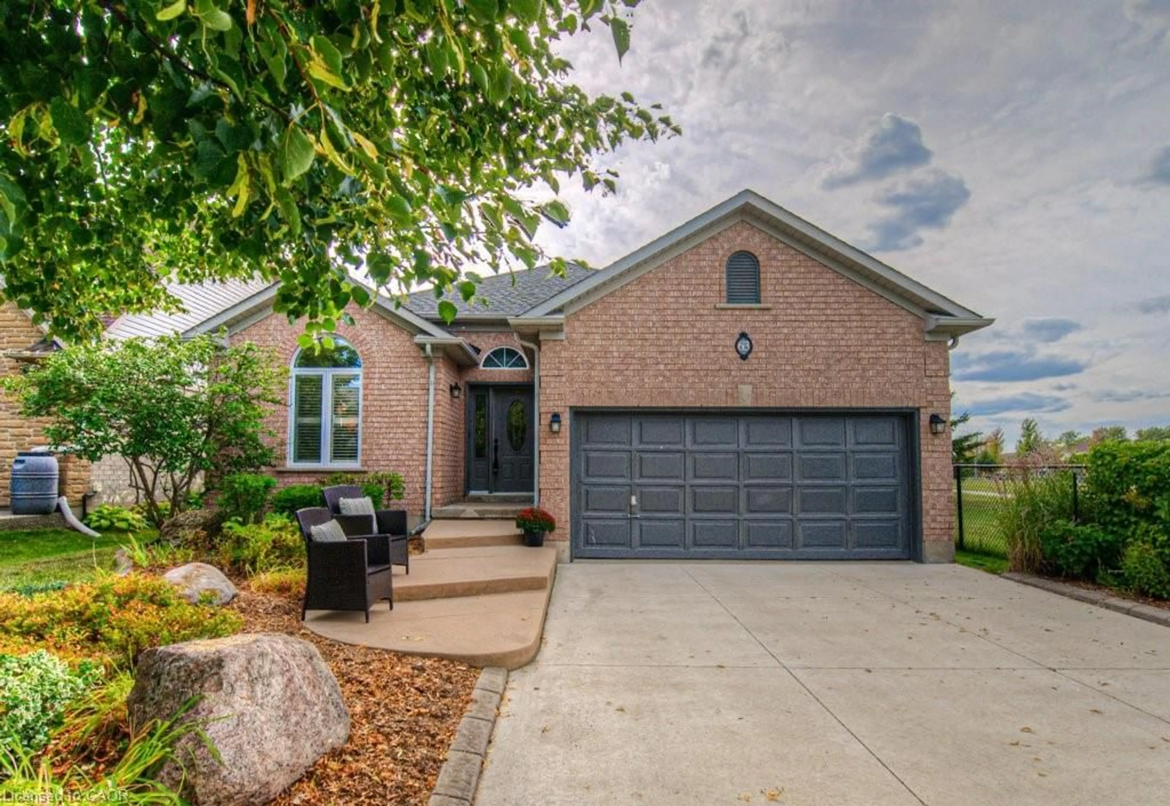 Home with brick exterior material, street for 63 Gatehouse Dr, Cambridge Ontario N1P 1C7