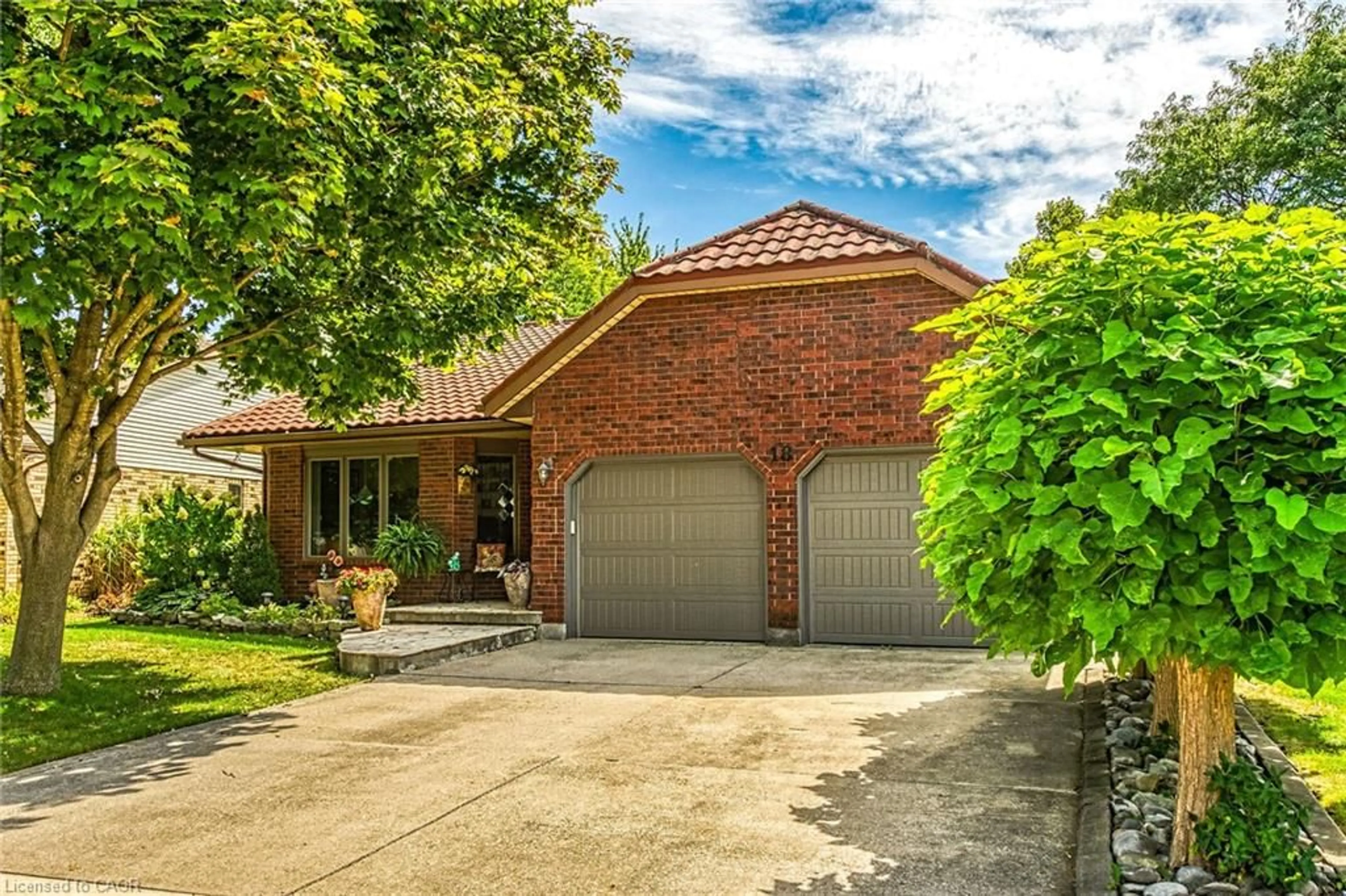 Home with brick exterior material, street for 18 Mcmaster Dr, Caledonia Ontario N3W 1G9