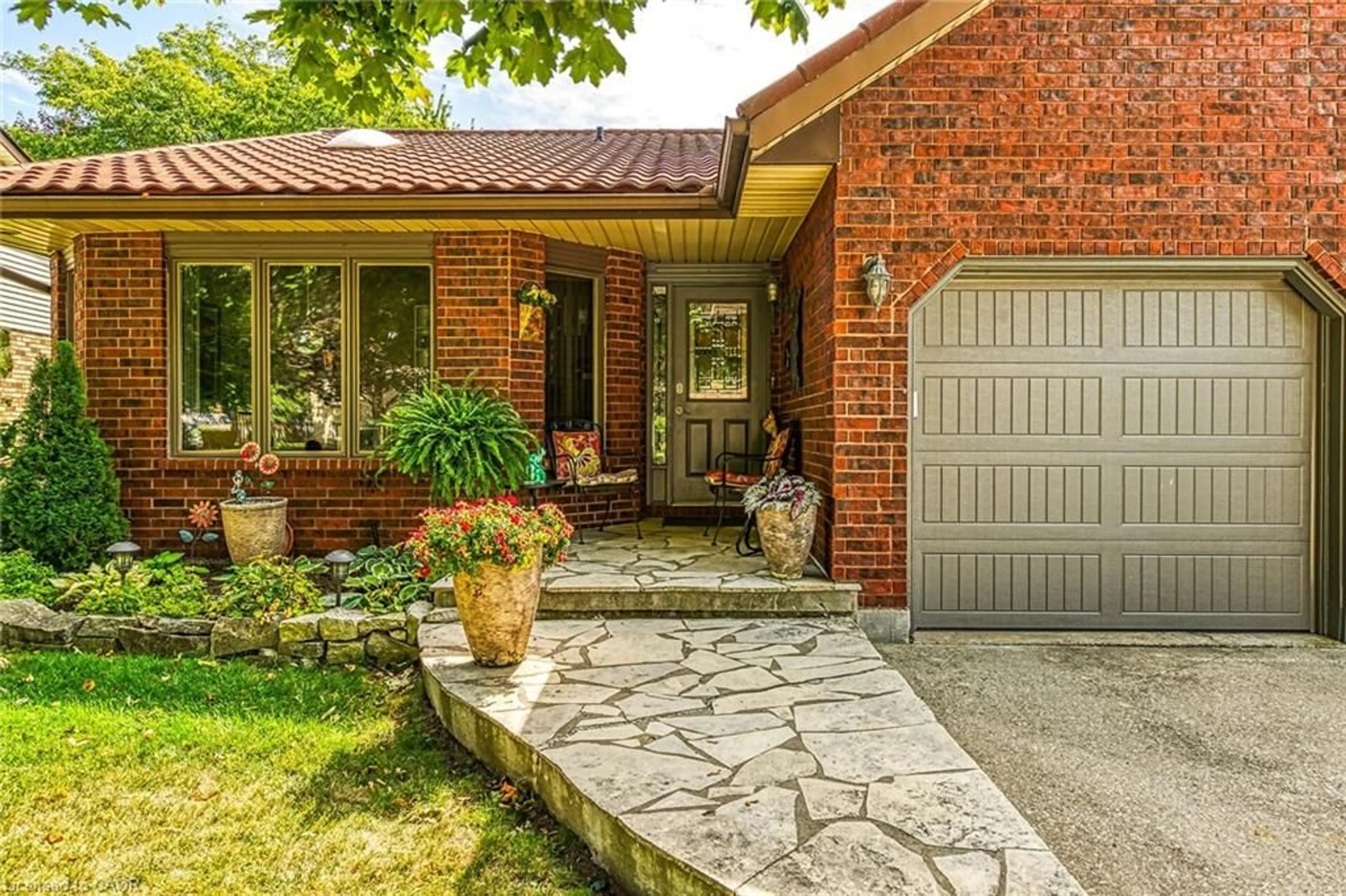 Home with brick exterior material, street for 18 Mcmaster Dr, Caledonia Ontario N3W 1G9