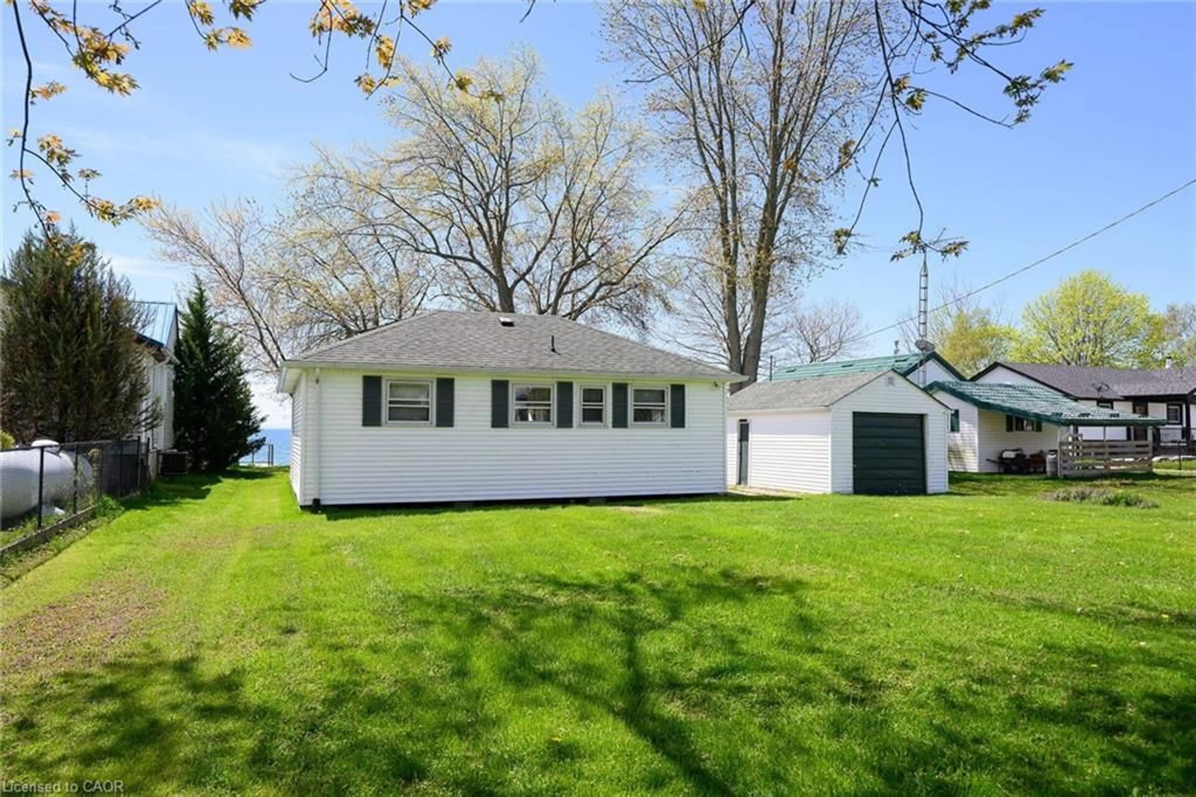 Home with vinyl exterior material, street for 13 Horseshoe Bay Rd, Dunnville Ontario N1A 2W8