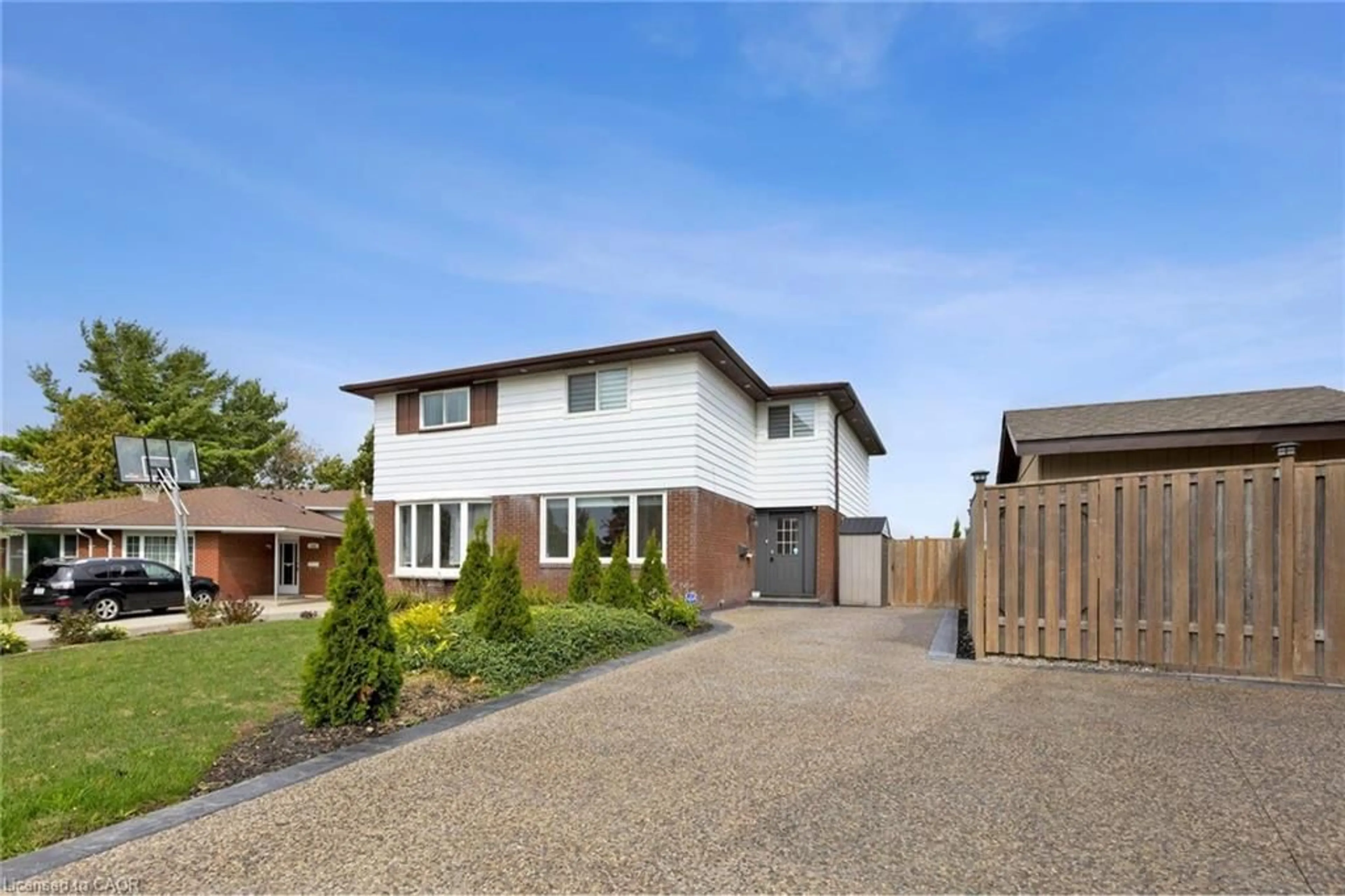 Home with brick exterior material, street for 122 Mooregate Cres, Kitchener Ontario N2M 2G1