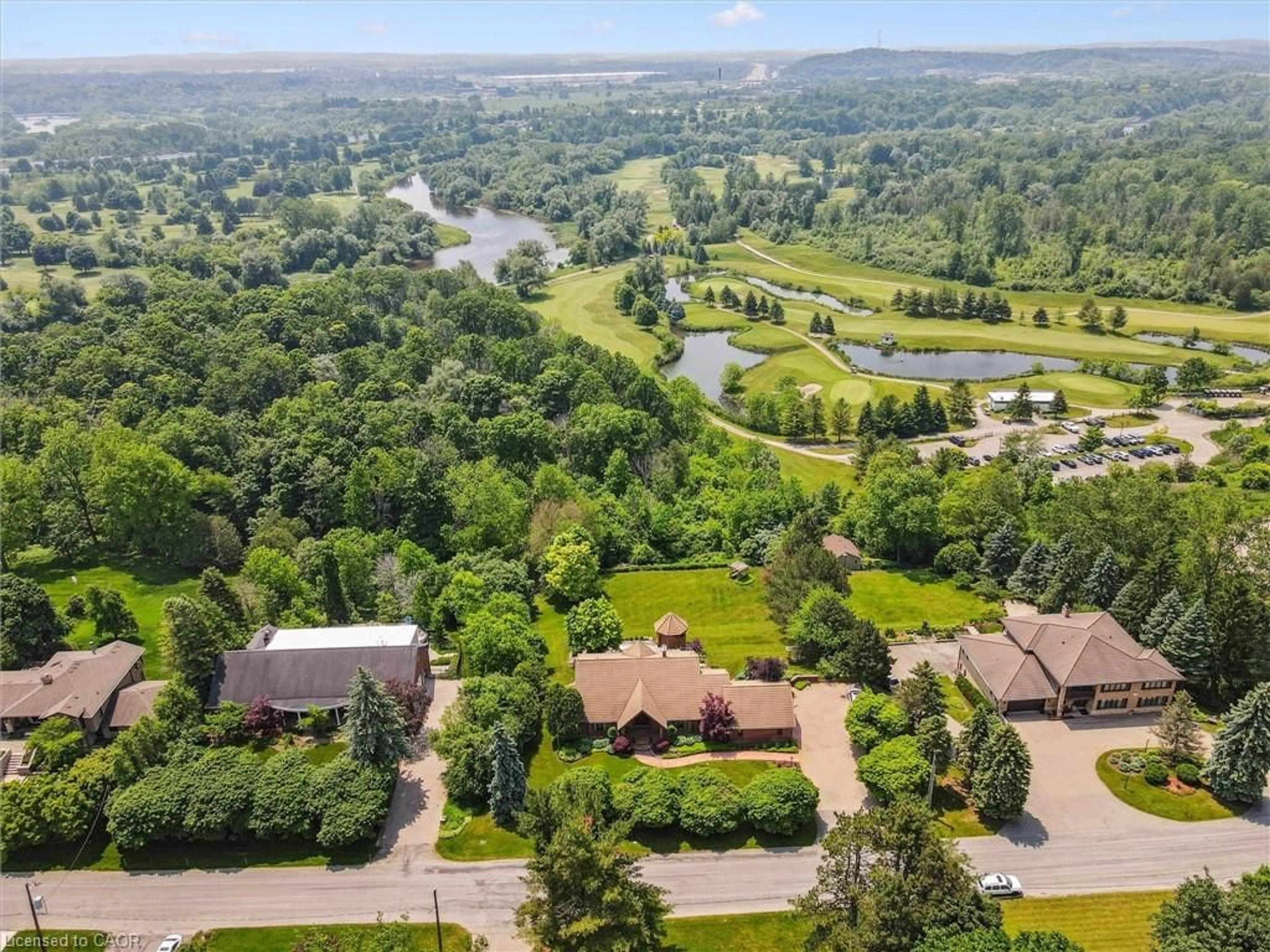 A pic from outside/outdoor area/front of a property/back of a property/a pic from drone, water/lake/river/ocean view for 211 Edgehill Dr, Kitchener Ontario N2P 2C6