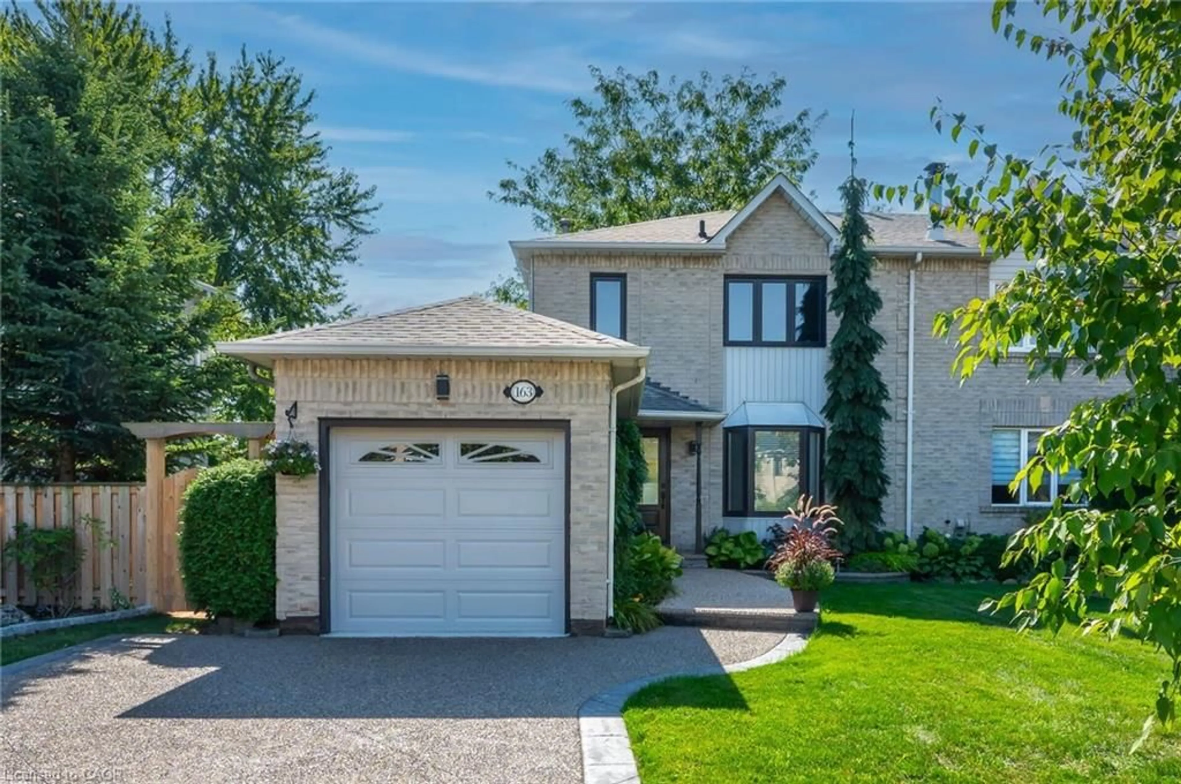 Home with brick exterior material, street for 163 Ross Lane, Oakville Ontario L6H 5K3