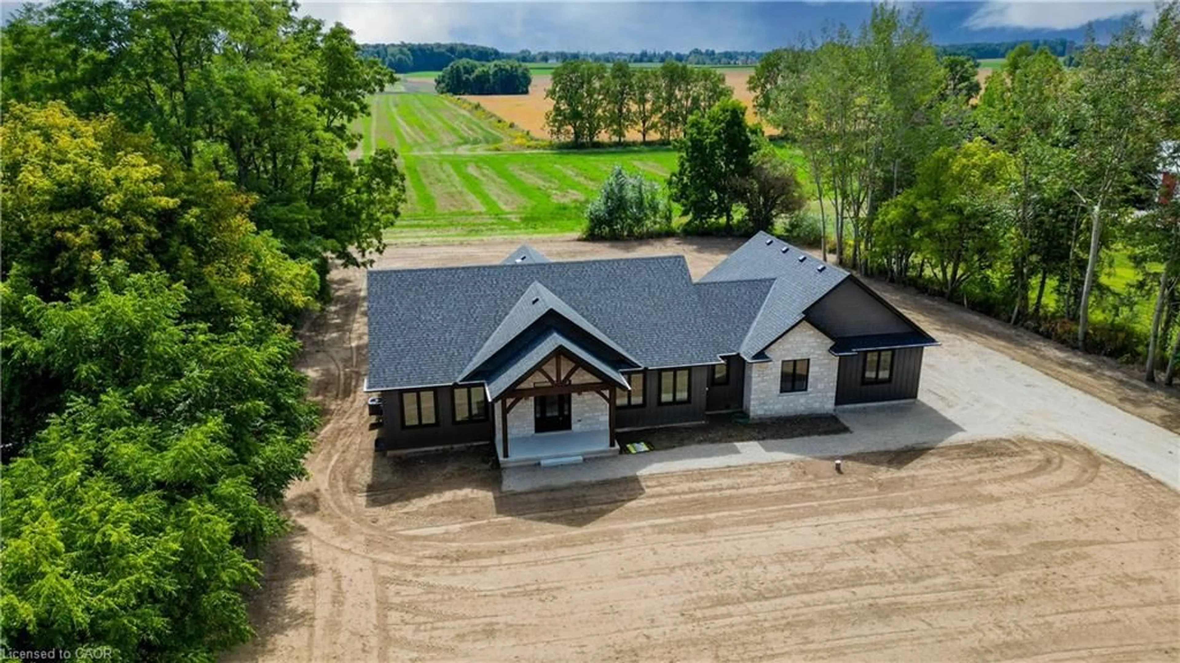A pic from outside/outdoor area/front of a property/back of a property/a pic from drone, building for 371 Harley Rd, New Durham Ontario N0E 1E0