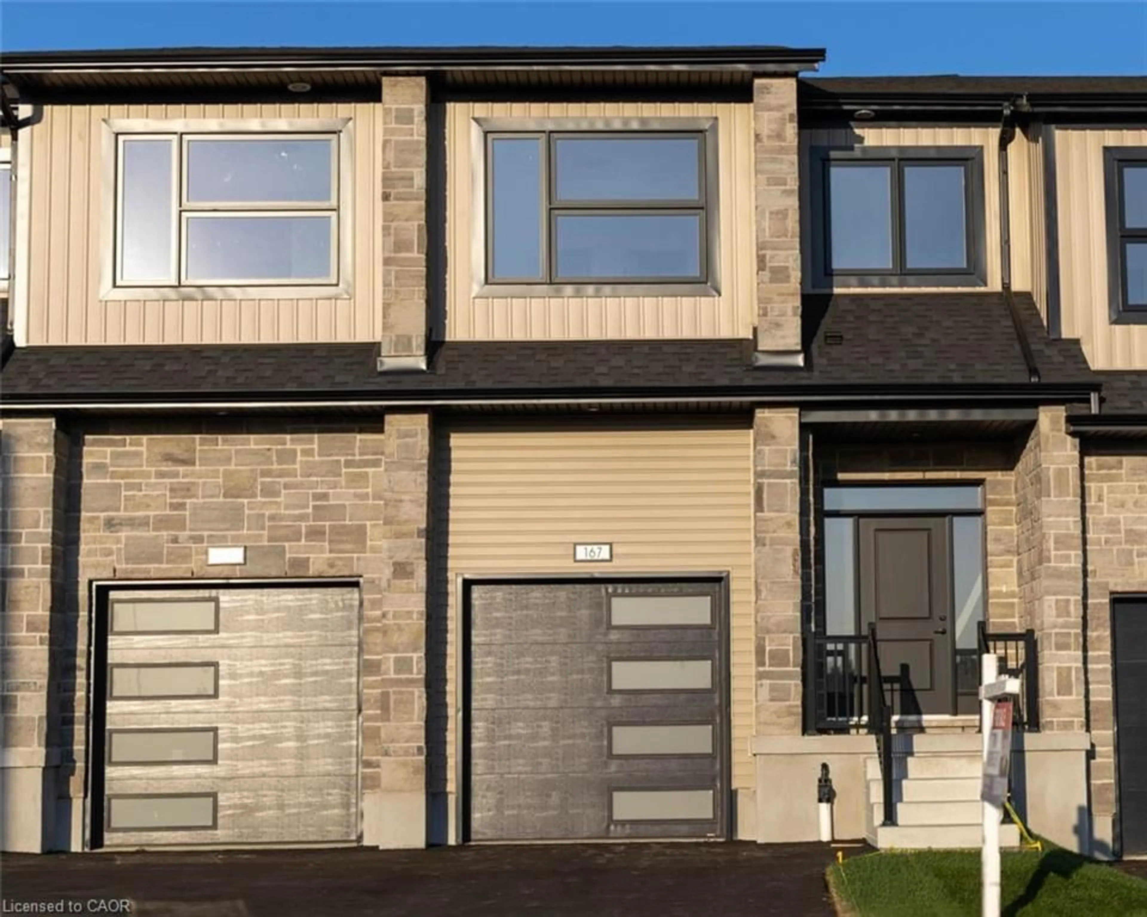 Home with vinyl exterior material, street for 167 Dunnigan Dr, Kitchener Ontario N2B 0B1