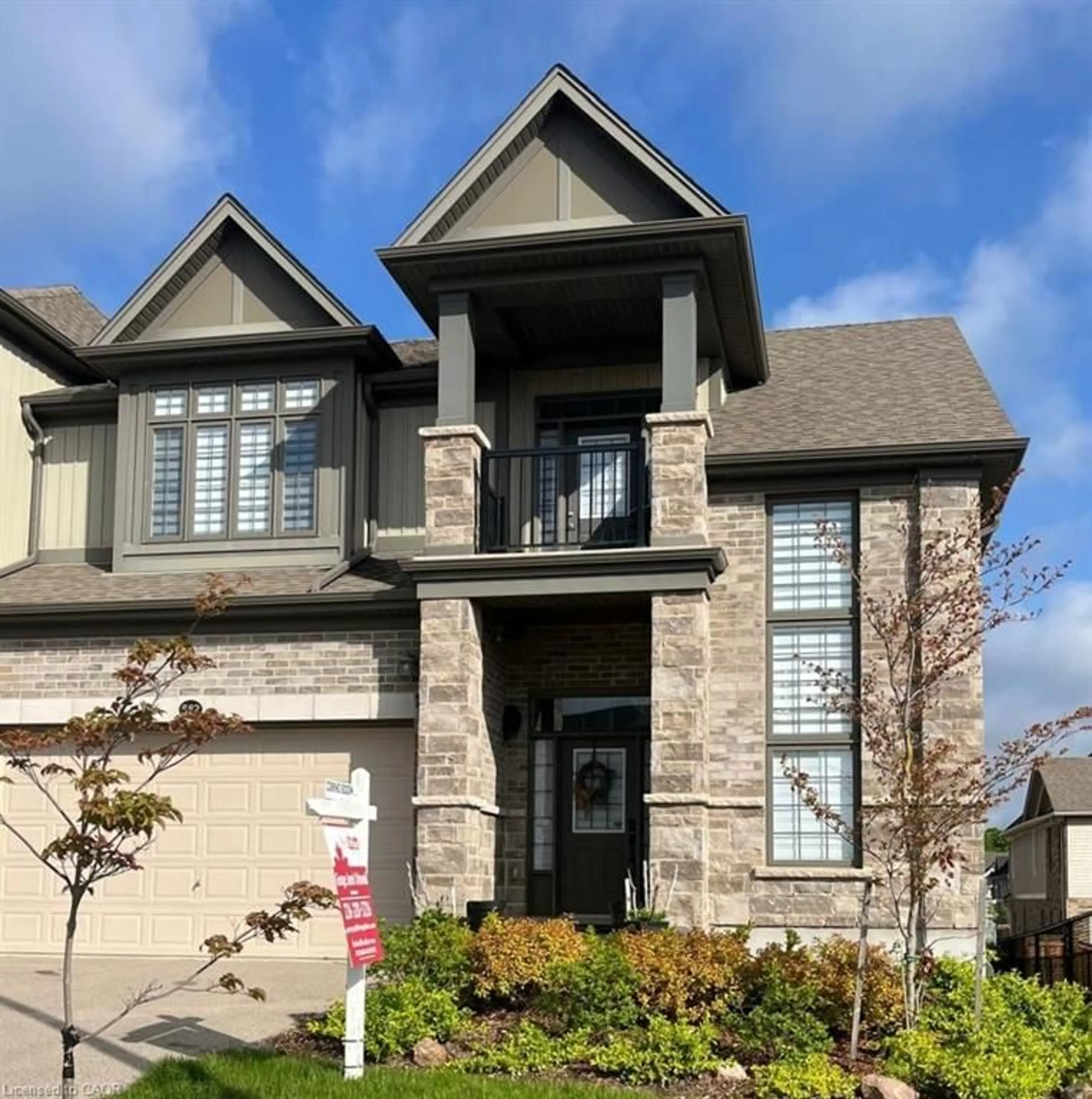 Home with brick exterior material, street for 582 Mayapple St, Waterloo Ontario N2V 0E3