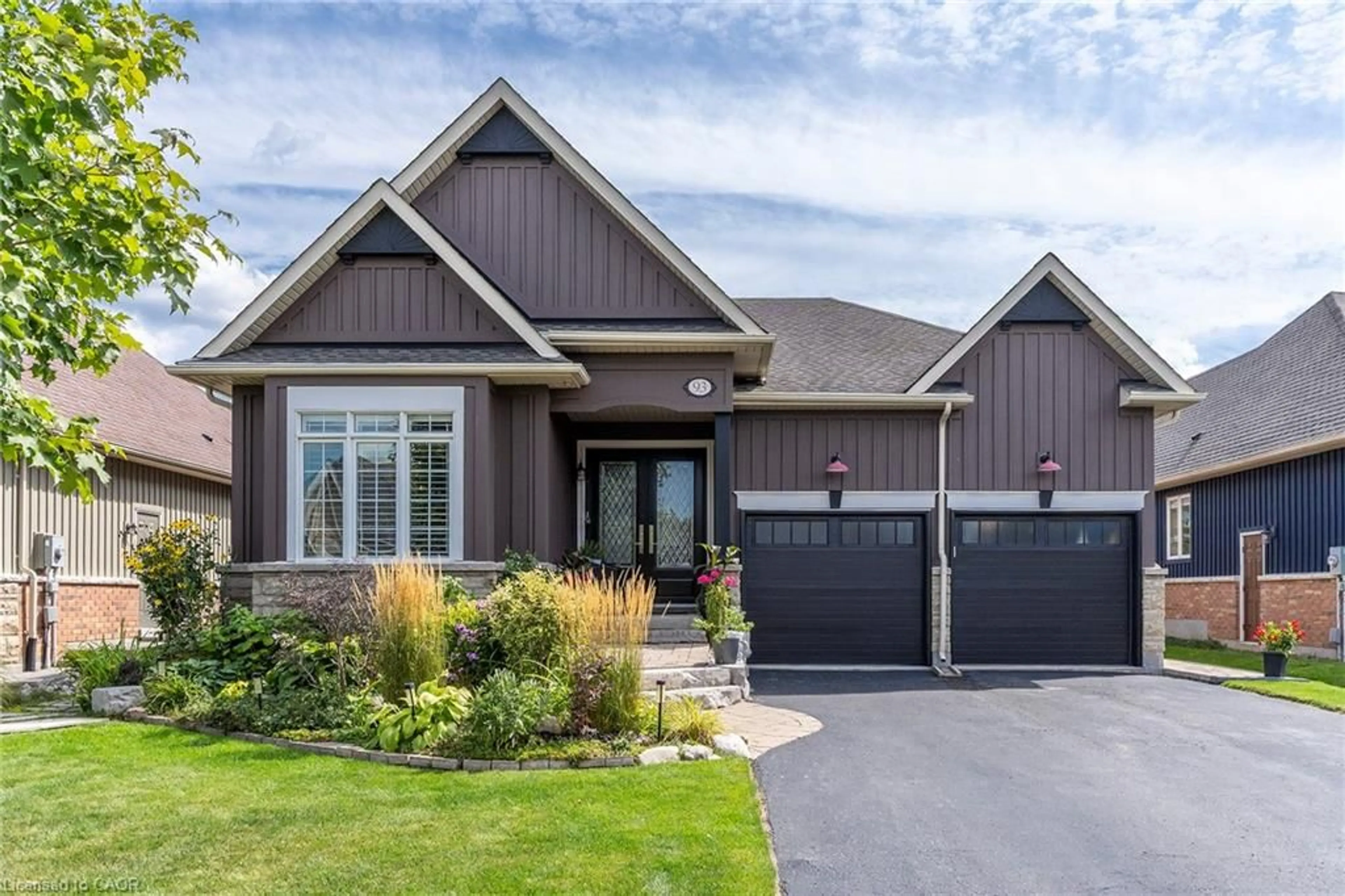 Home with brick exterior material, street for 93 Aberfoyle Mill Cres, Guelph Ontario N1H 6H9