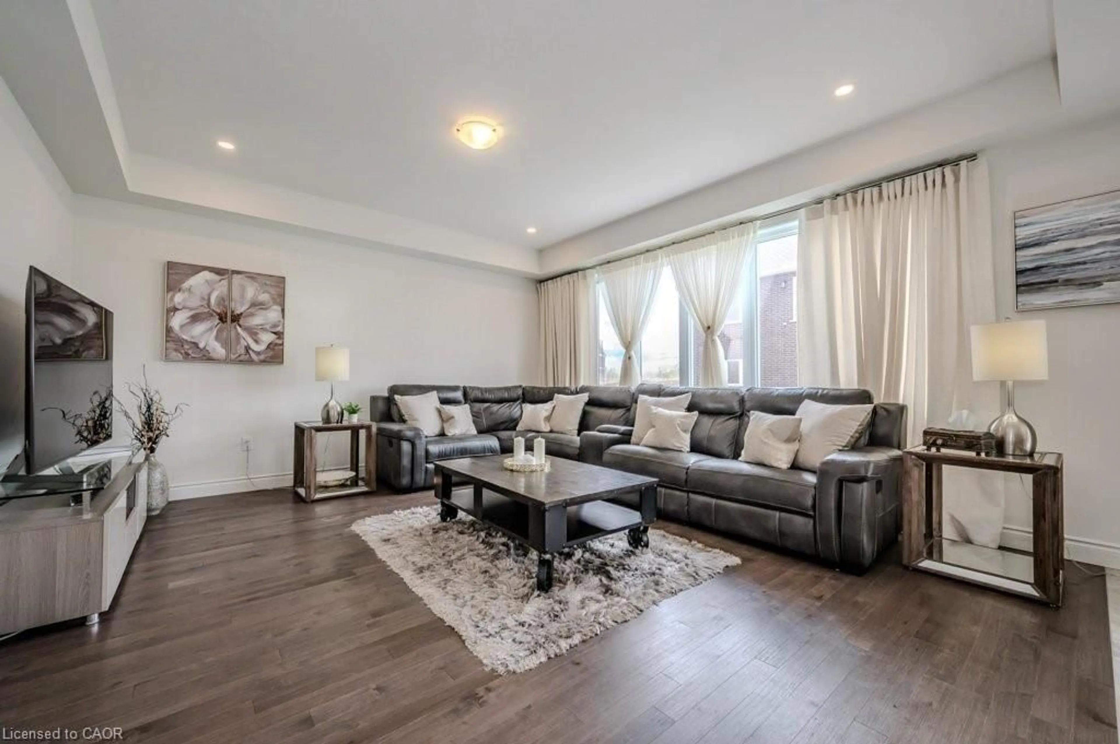 Living room with furniture, wood/laminate floor for 151 Harrison St, Elora Ontario N0B 1S0