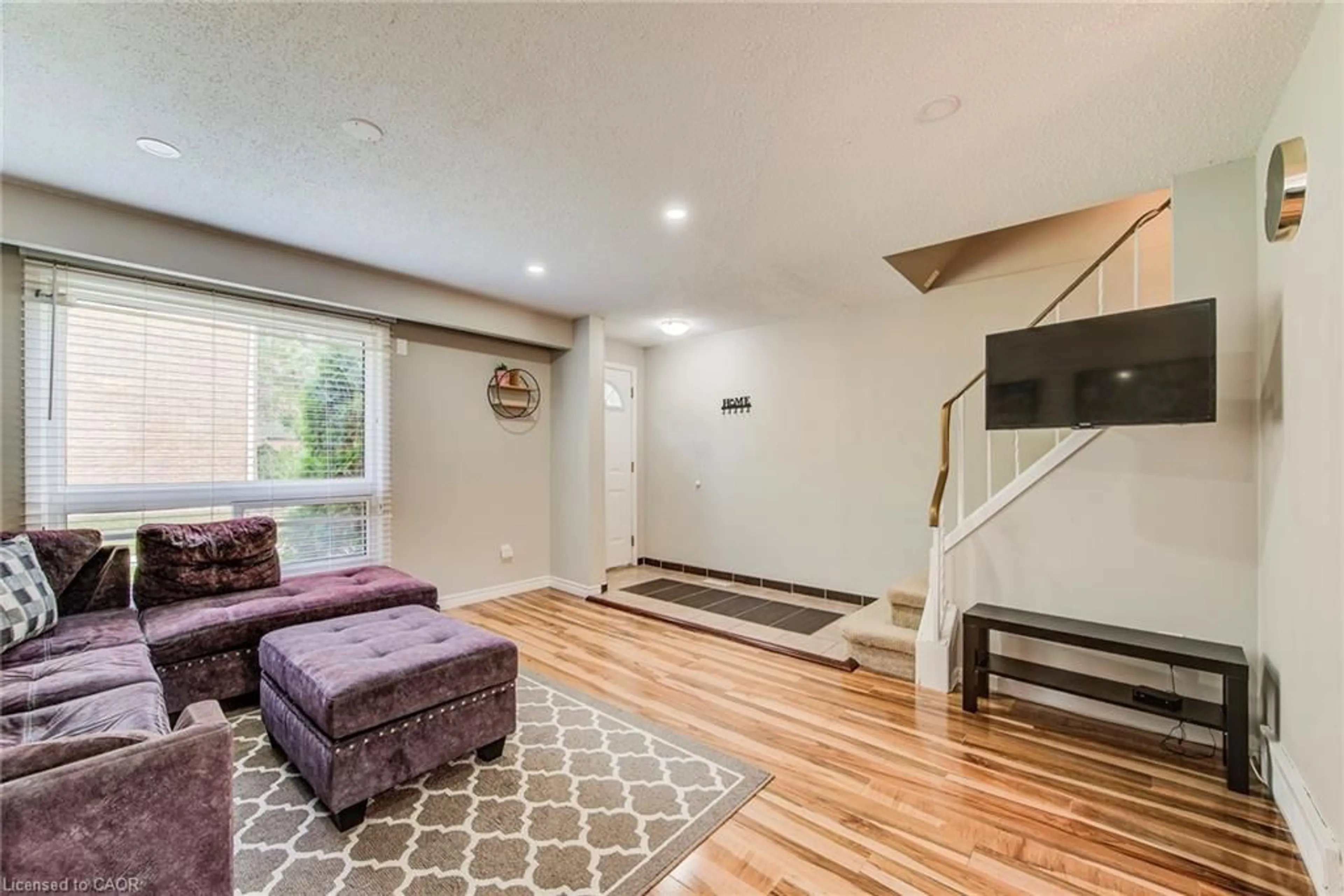 Living room with furniture, unknown for 165 Green Valley Dr #16, Kitchener Ontario N2P 1K3