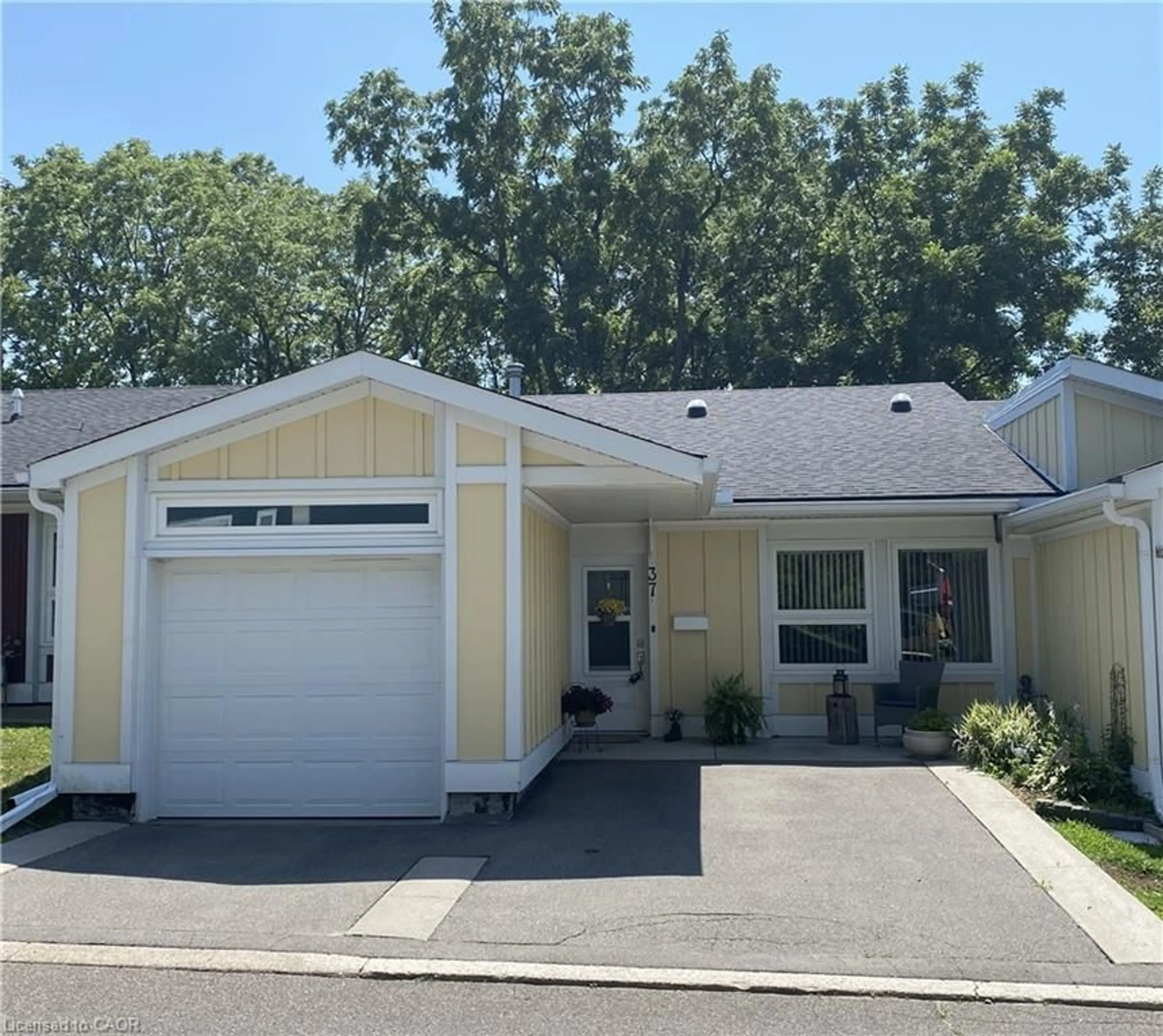 Home with vinyl exterior material, street for 37 Bishop Tonnos Way, Hamilton Ontario L9B 2L7