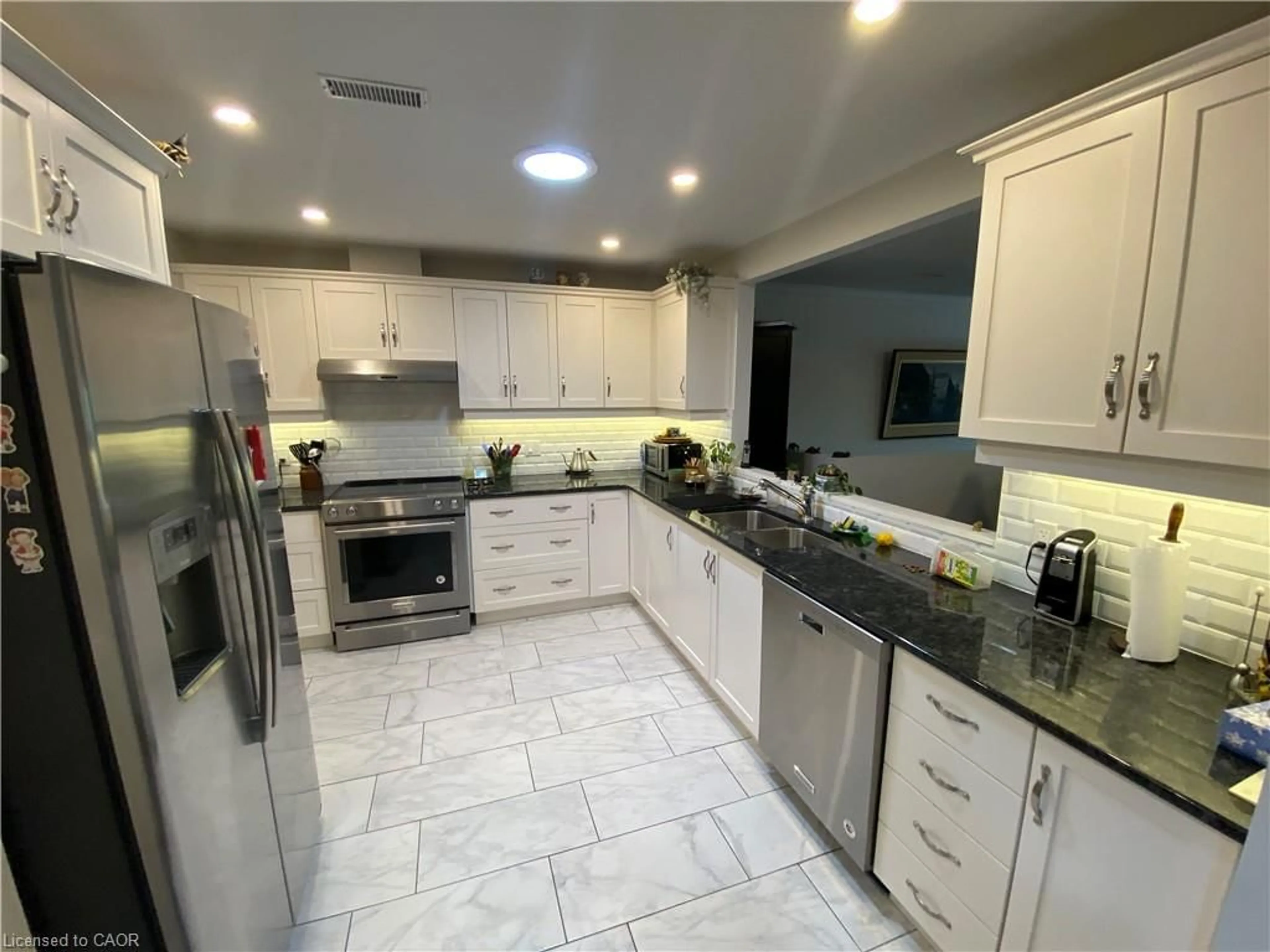 Open concept kitchen, ceramic/tile floor for 37 Bishop Tonnos Way, Hamilton Ontario L9B 2L7