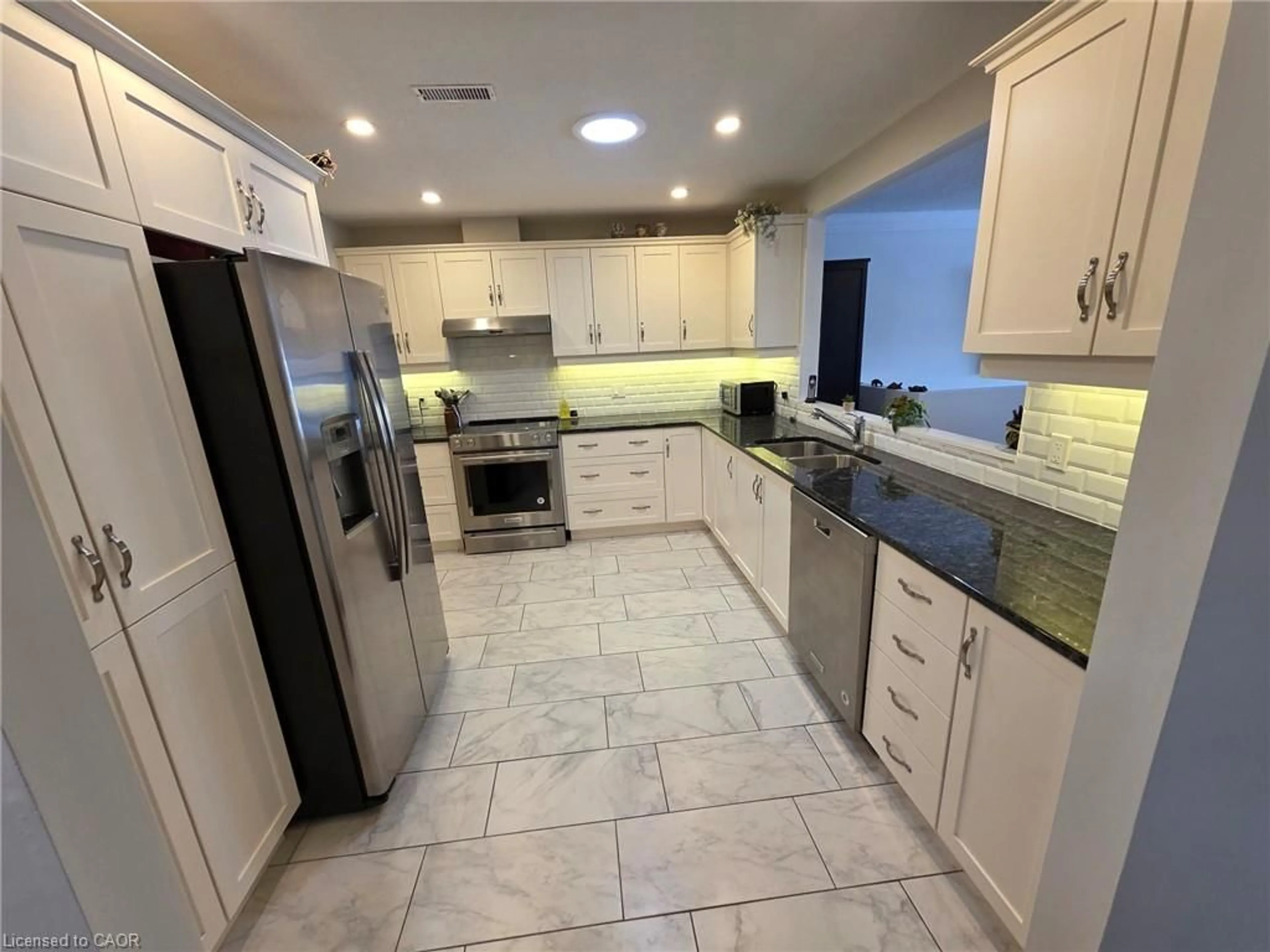 Open concept kitchen, ceramic/tile floor for 37 Bishop Tonnos Way, Hamilton Ontario L9B 2L7