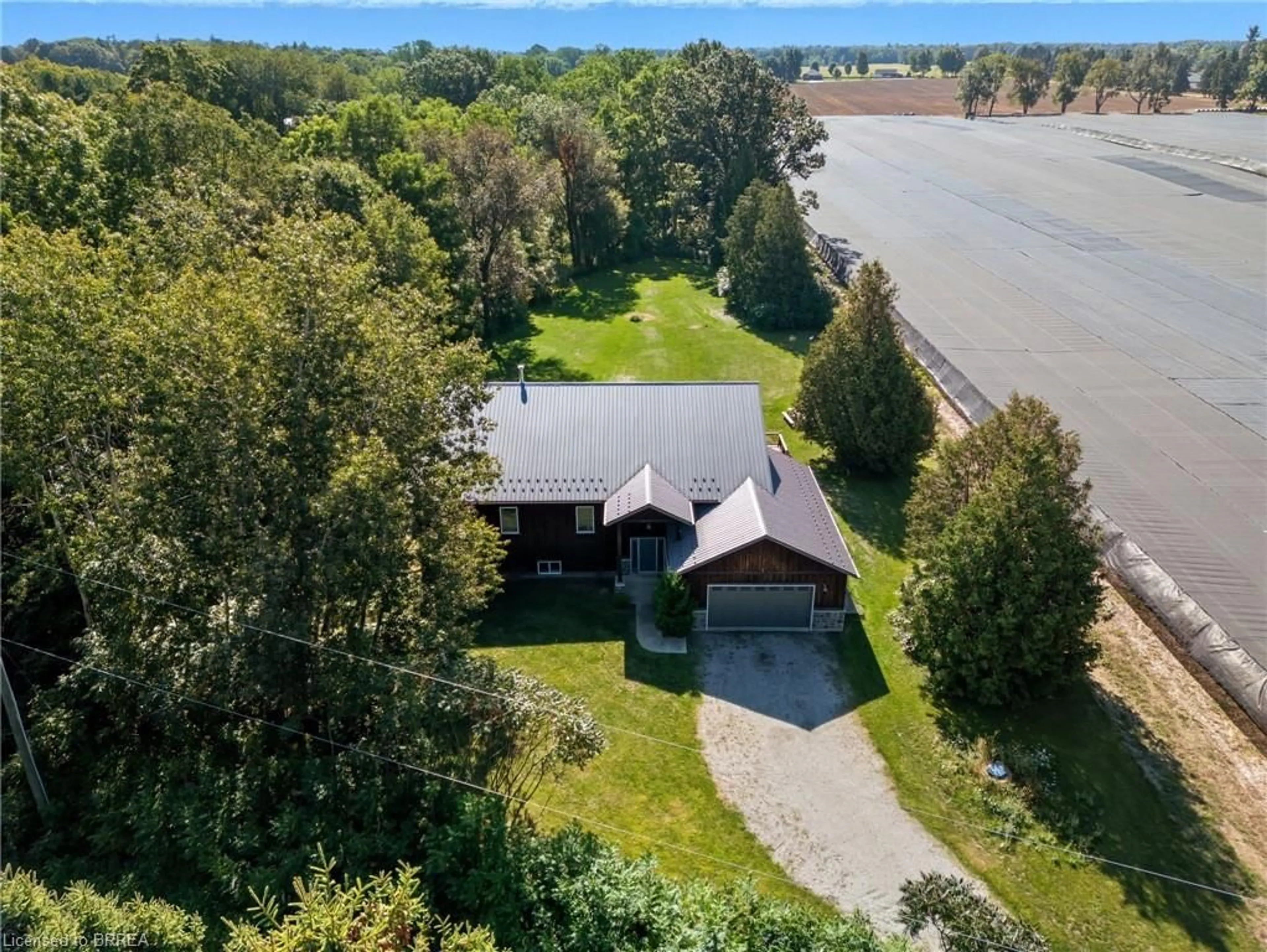 A pic from outside/outdoor area/front of a property/back of a property/a pic from drone, water/lake/river/ocean view for 126 Shorties Side Rd, Norfolk County Ontario N4G 4G9