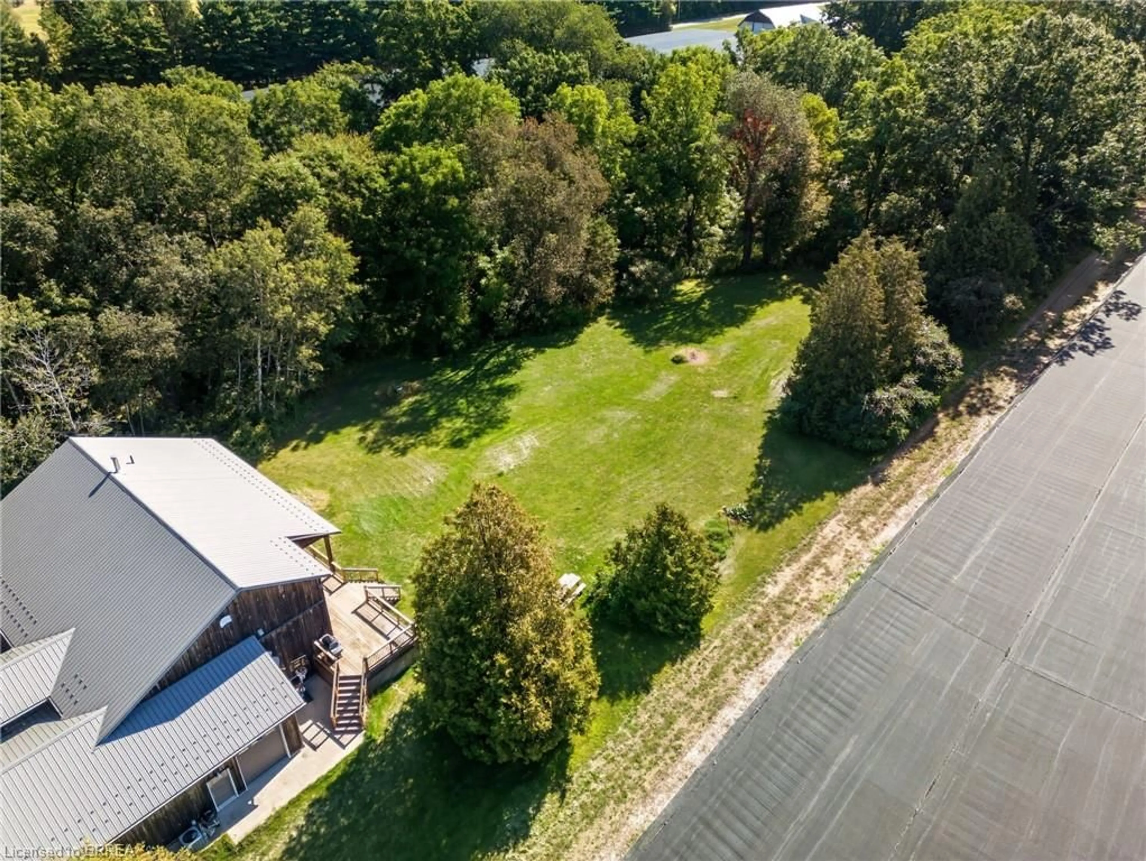 A pic from outside/outdoor area/front of a property/back of a property/a pic from drone, forest/trees view for 126 Shorties Side Rd, Norfolk County Ontario N4G 4G9