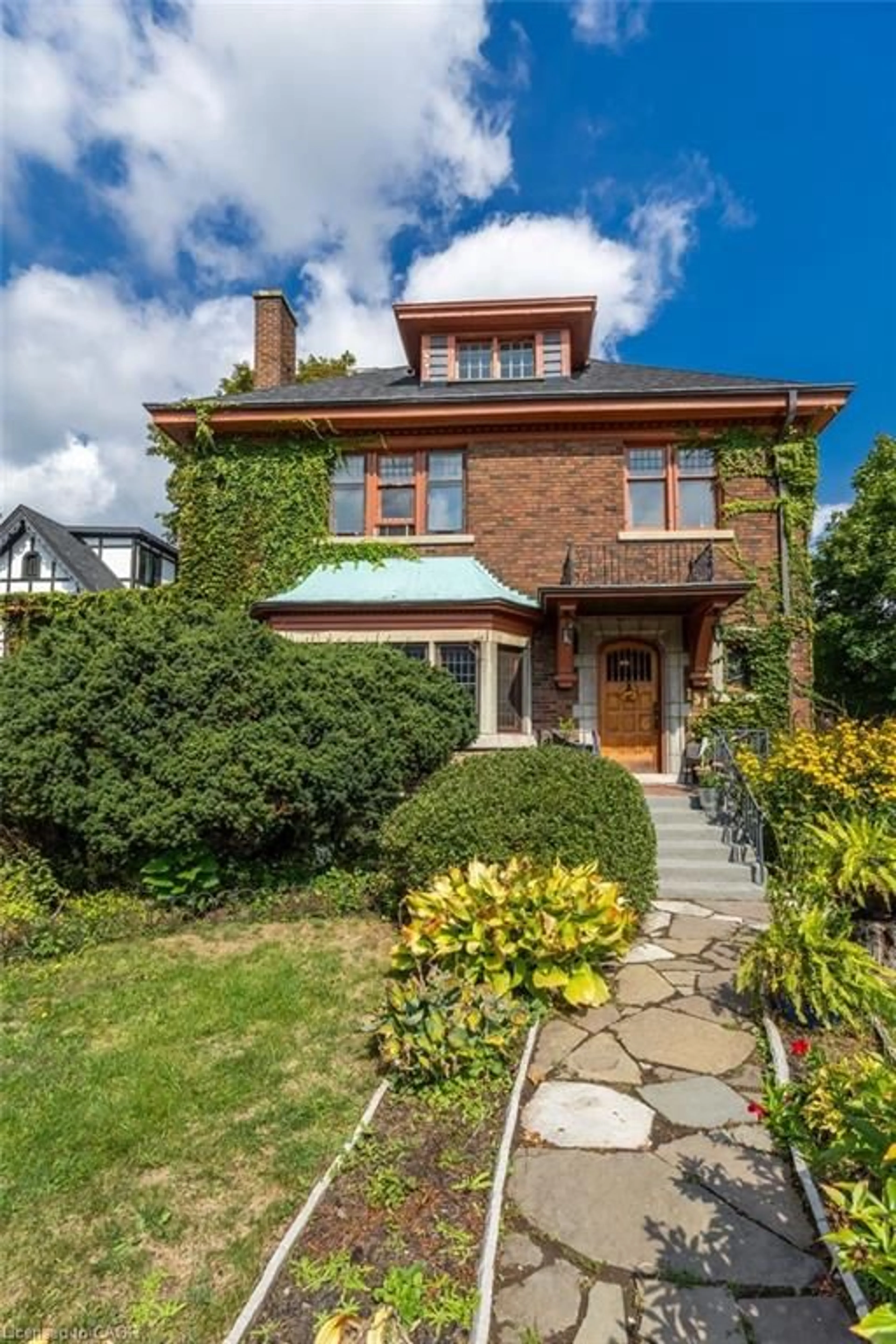 Home with brick exterior material, street for 151 Delaware Ave, Hamilton Ontario L8M 1V5