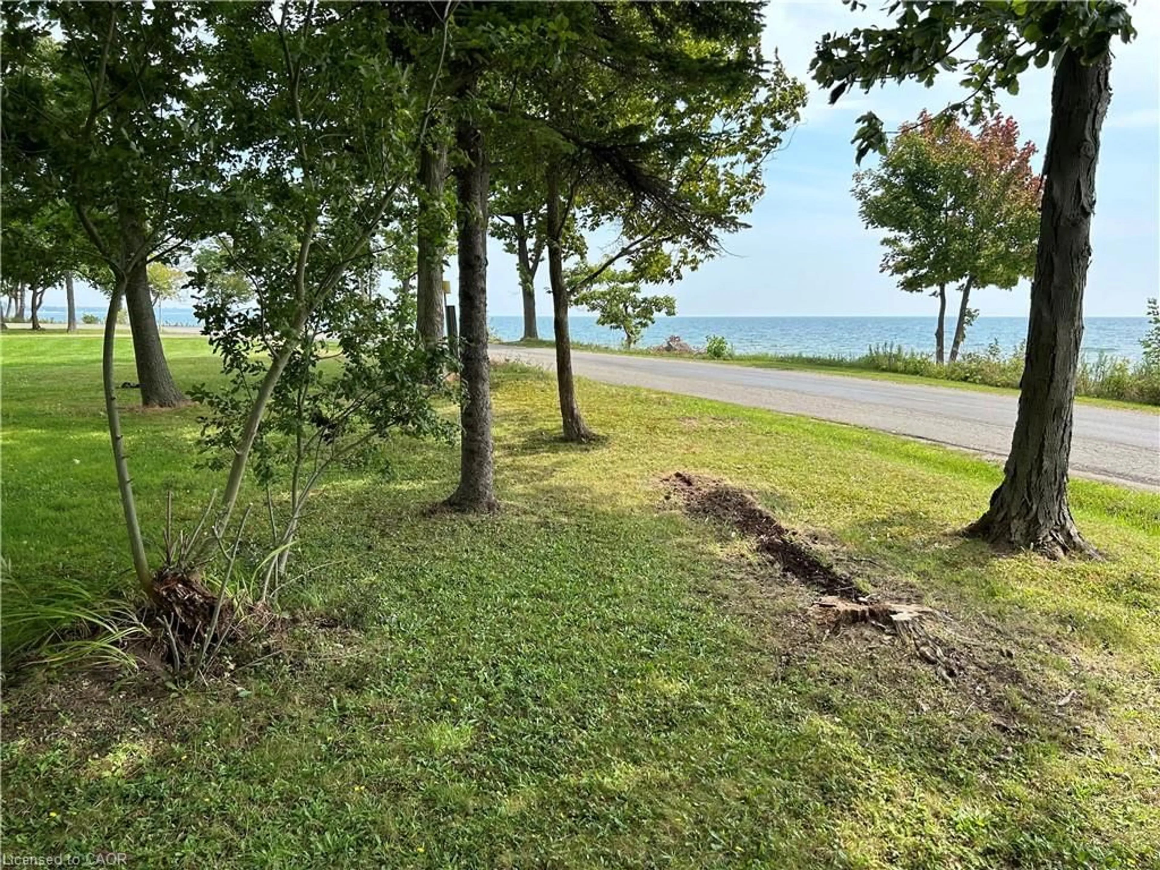 A pic from outside/outdoor area/front of a property/back of a property/a pic from drone, water/lake/river/ocean view for 2431 Lakeshore Rd, Dunnville Ontario N1A 2W8