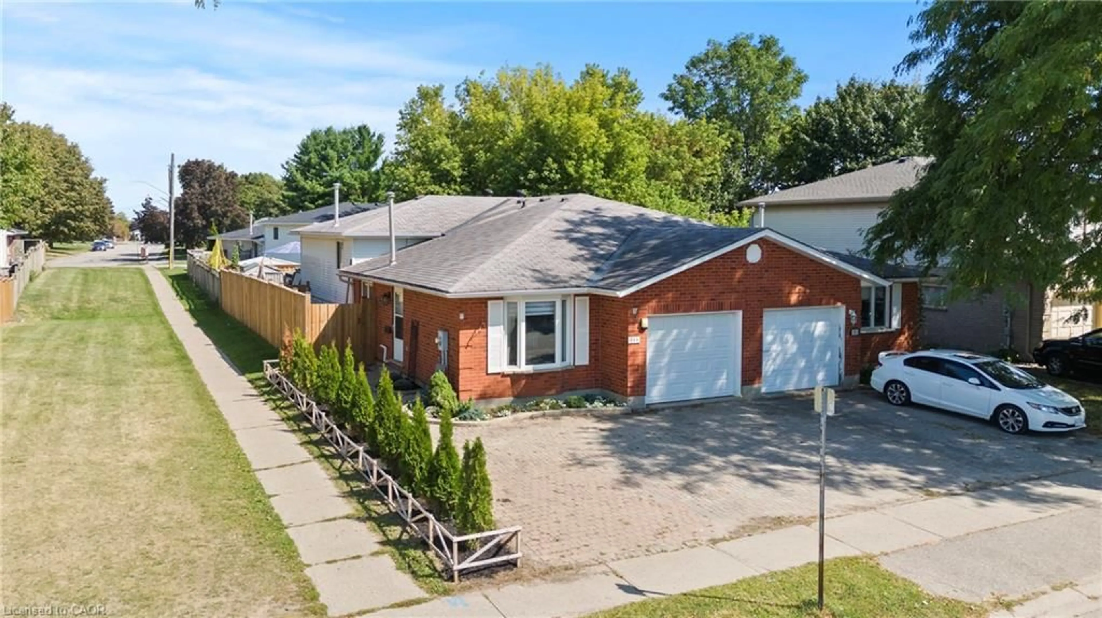 A pic from outside/outdoor area/front of a property/back of a property/a pic from drone, street for 15 Oak Ave #a, Paris Ontario N3L 3C6