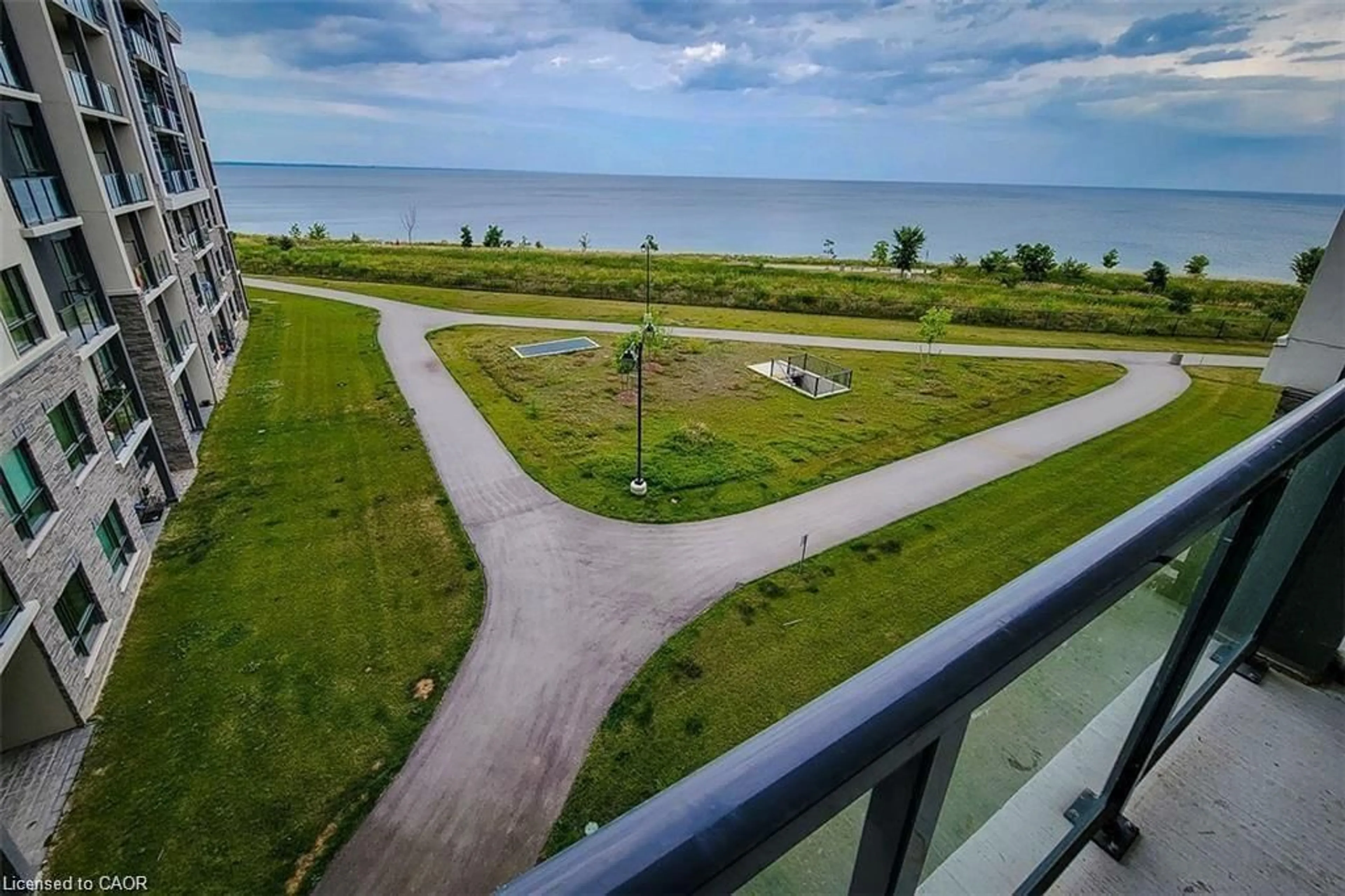 A pic from outside/outdoor area/front of a property/back of a property/a pic from drone, water/lake/river/ocean view for 101 Shoreview Pl #401, Hamilton Ontario L8E 0K2