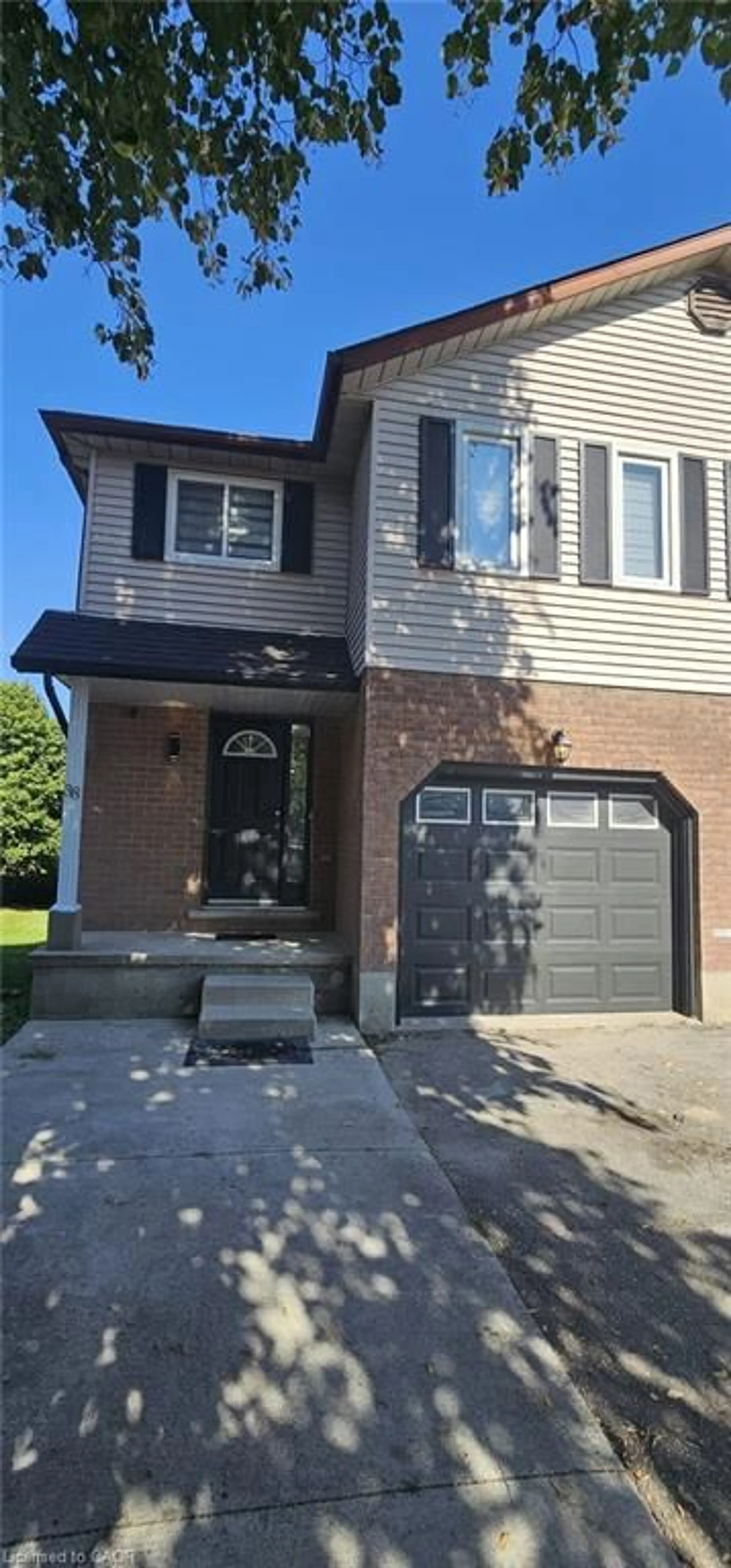 Home with brick exterior material, street for 38 Poplar Dr, Cambridge Ontario N3C 3X2