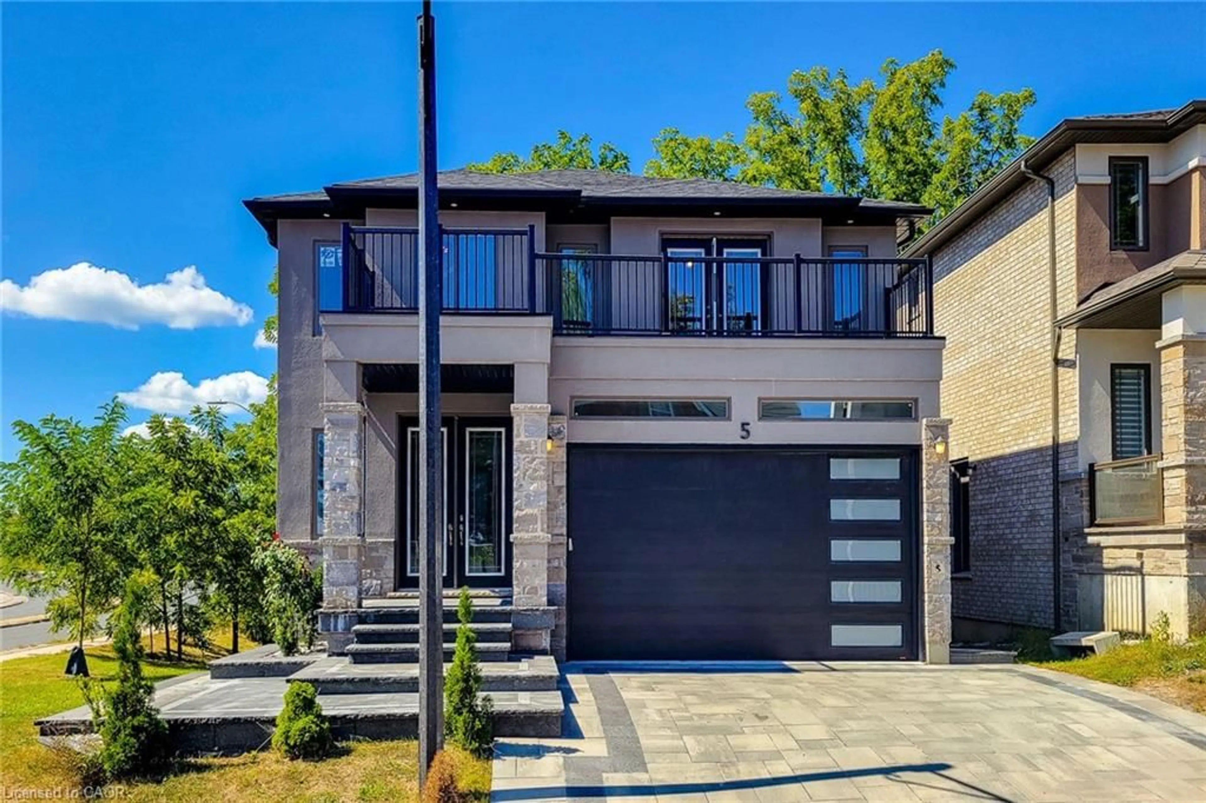 Home with brick exterior material, street for 1261 Mohawk Rd #5, Ancaster Ontario L9G 3K9