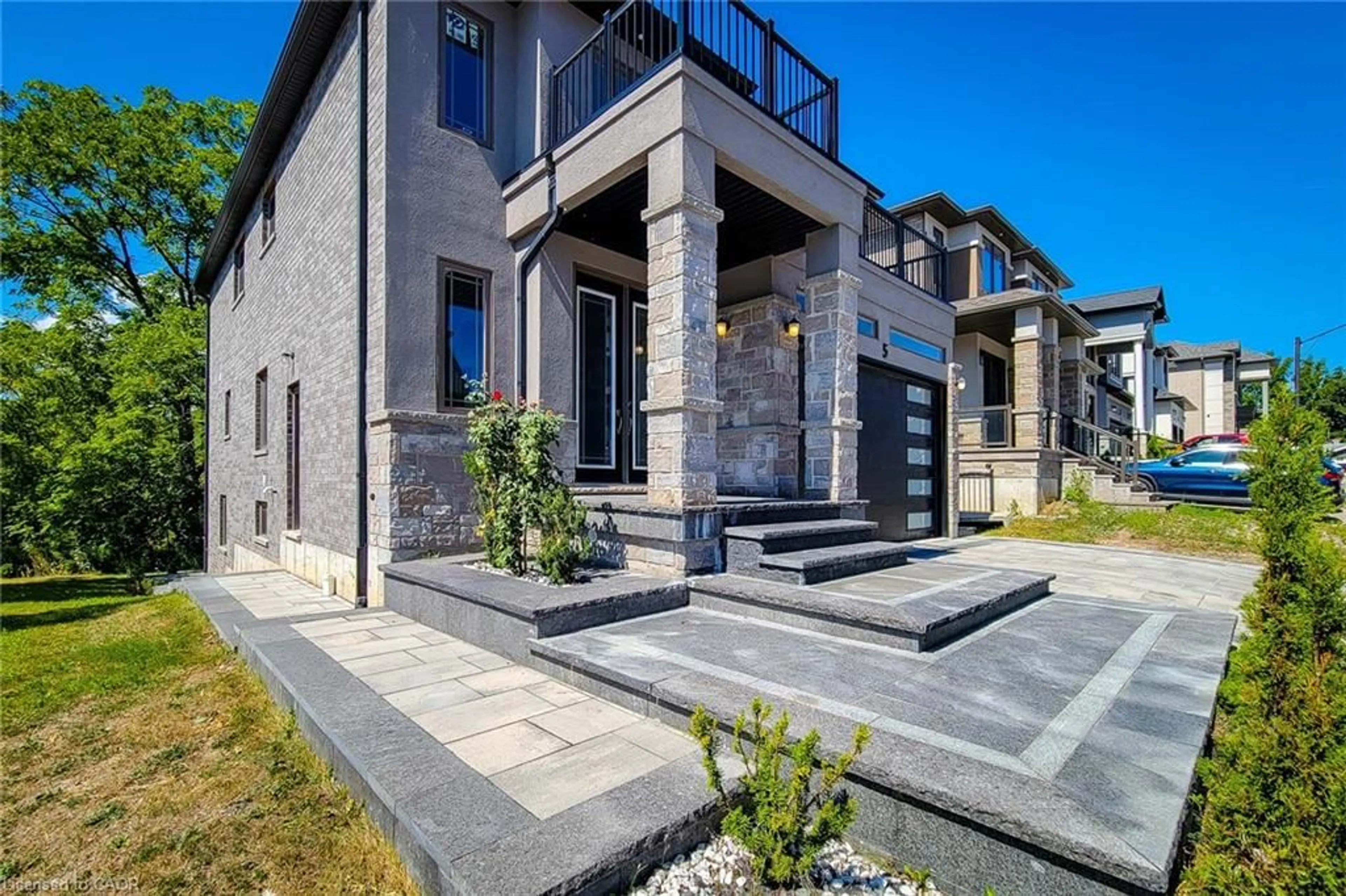 Home with brick exterior material, street for 1261 Mohawk Rd #5, Ancaster Ontario L9G 3K9